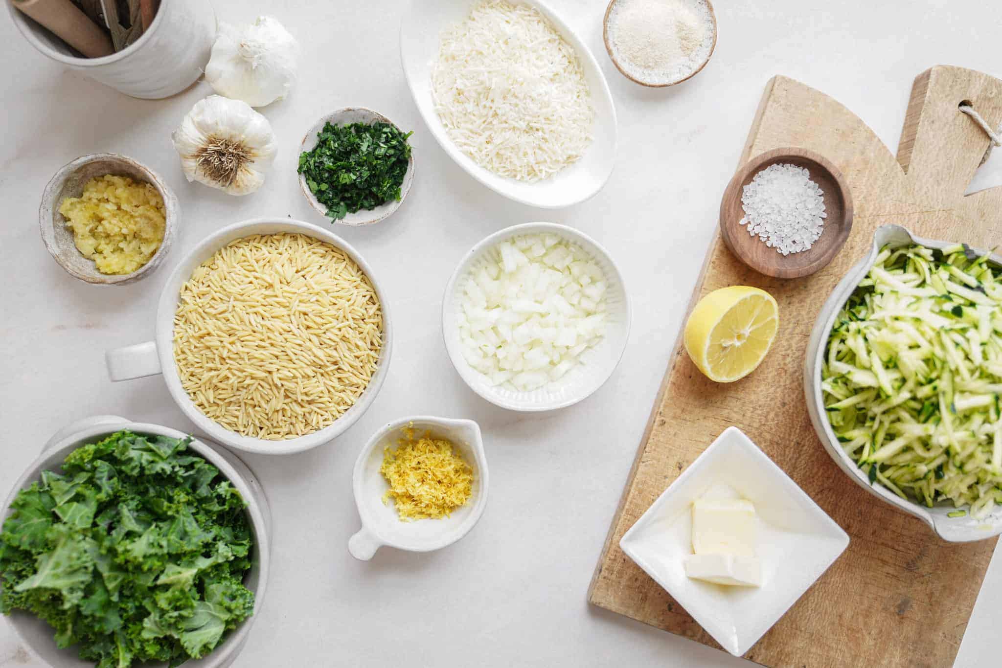 Fresh ingredients for lemon orozo soup on counter