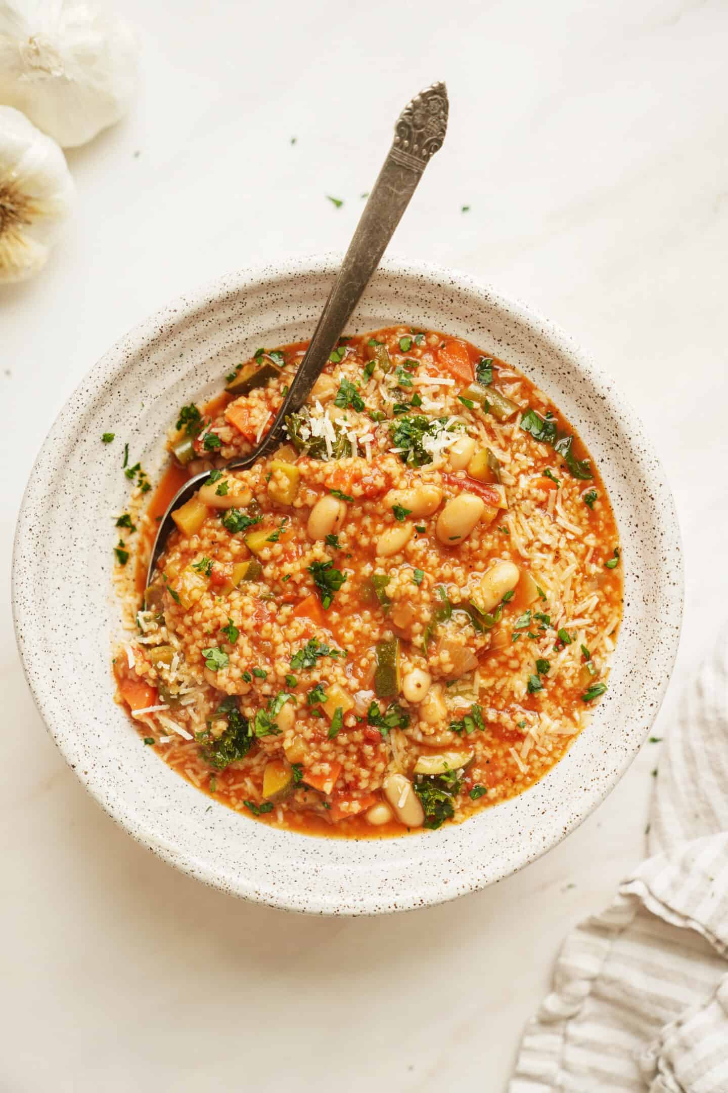 Big bowl of minestrone soup recipe with spoon in the bowl