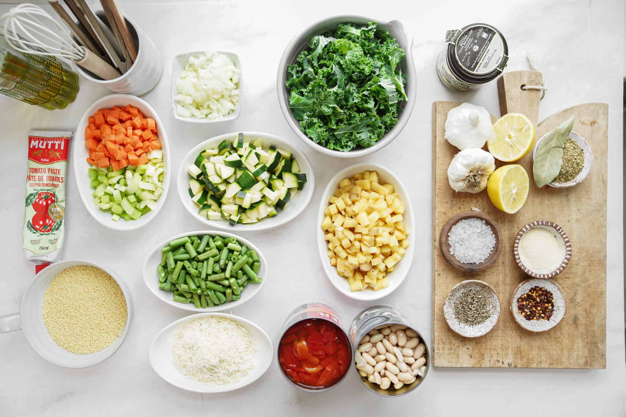 Fresh ingredients for the minestrone soup recipe on counter