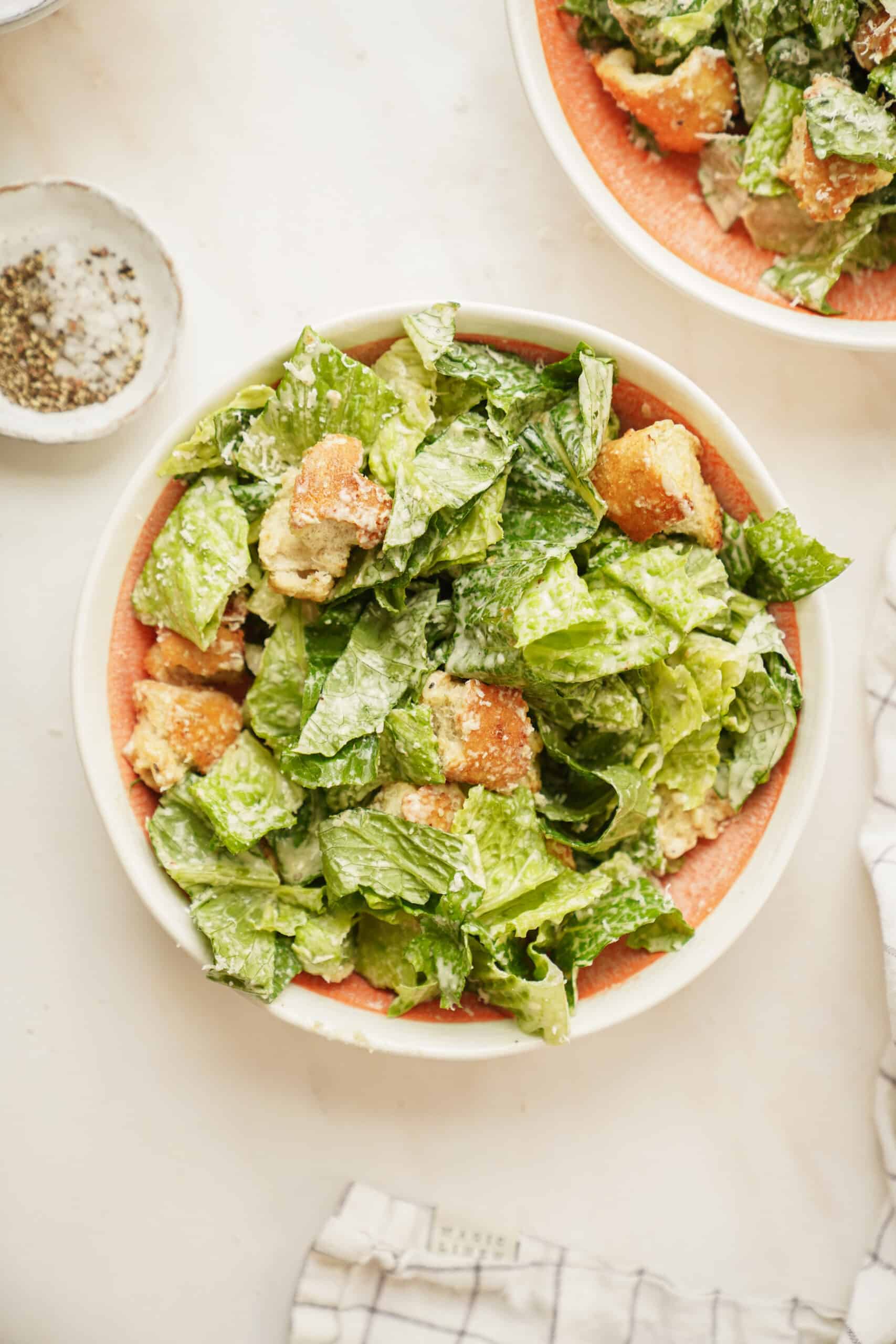 Caesar salad recipe in a bowl with crotons 