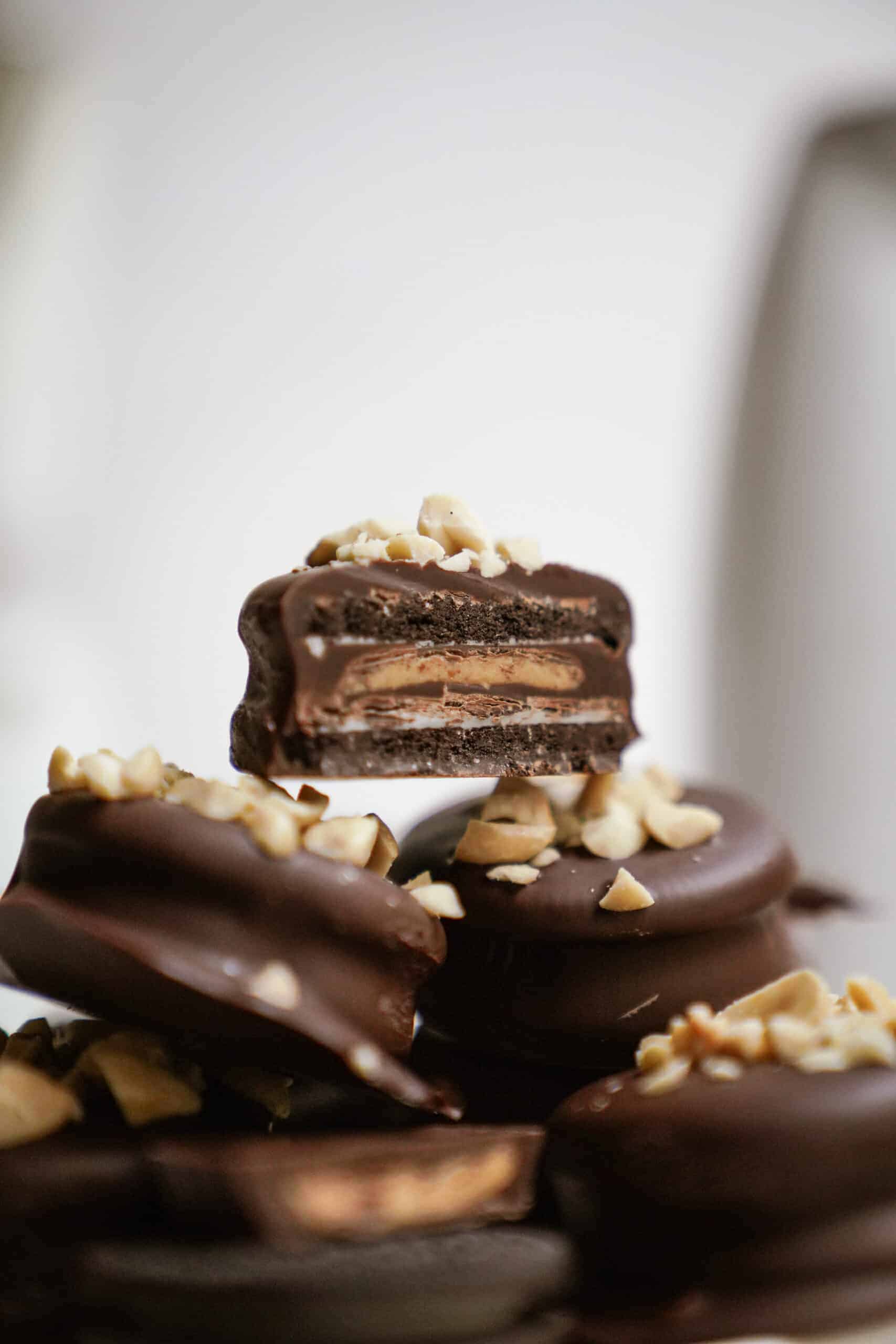 Close-up of stack of Chocolate Dipped Peanut Butter Cup Stuffed Oreos