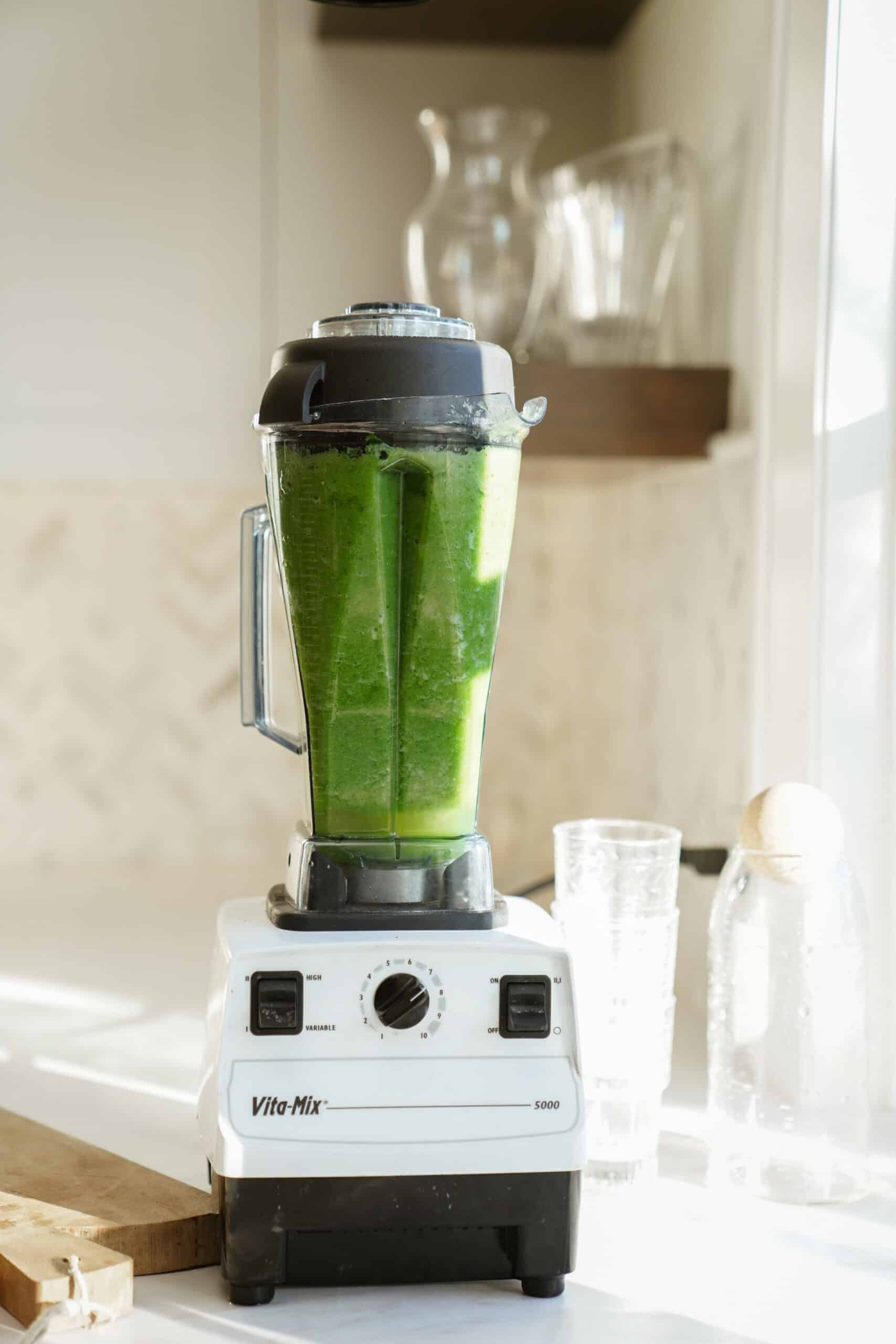 Fresh ingredients in blender for green juice recipe