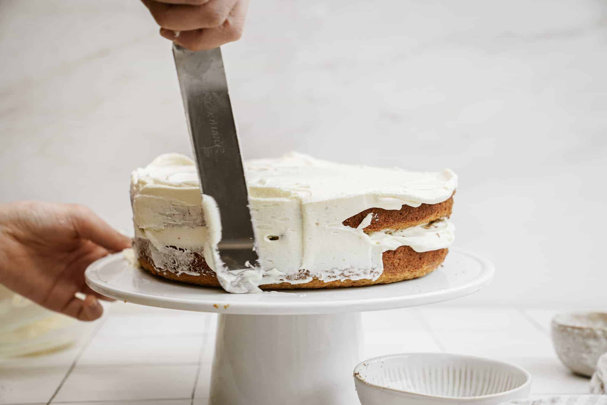 cream cheese spread on carrot cake