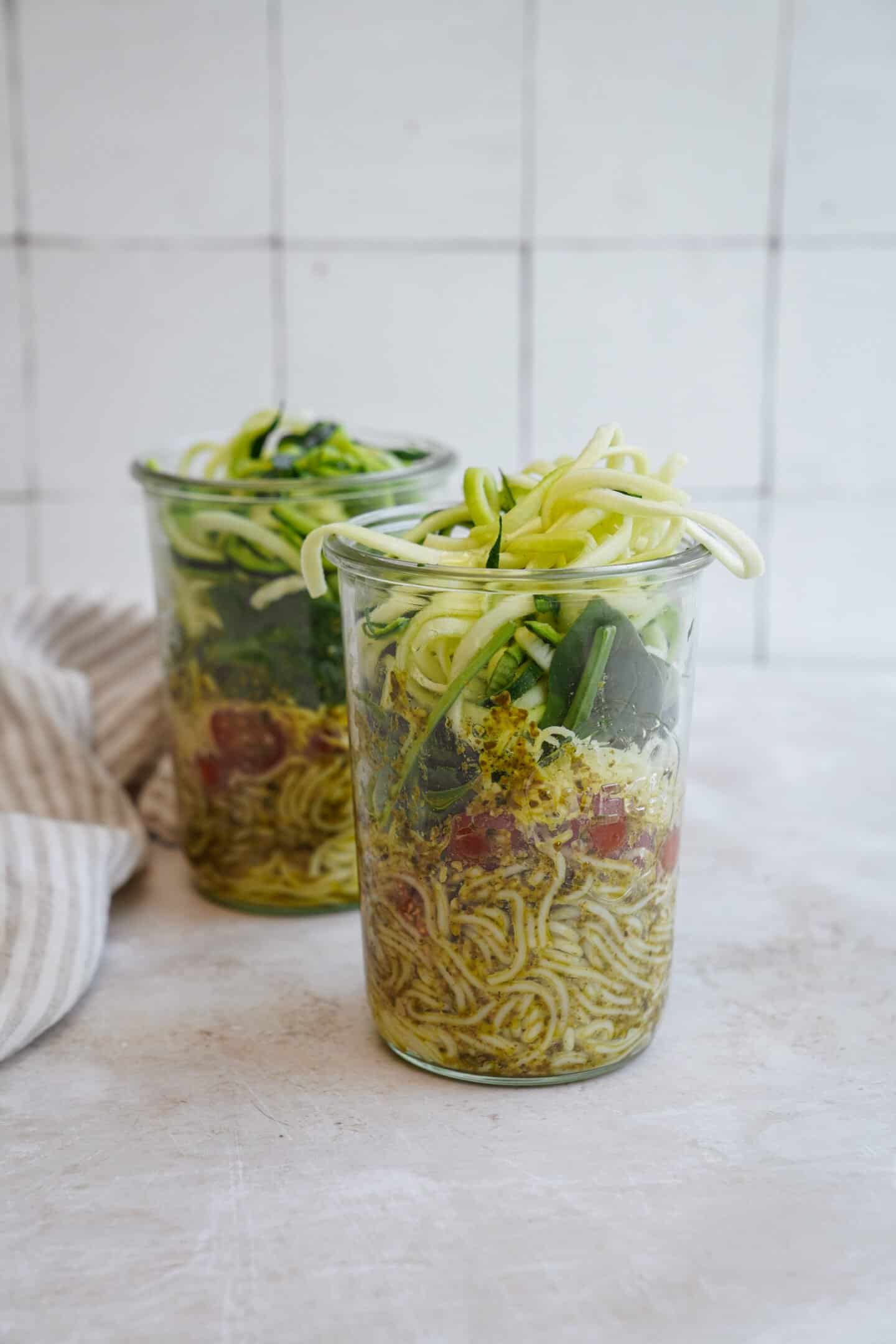 Mason jar salads on a counter