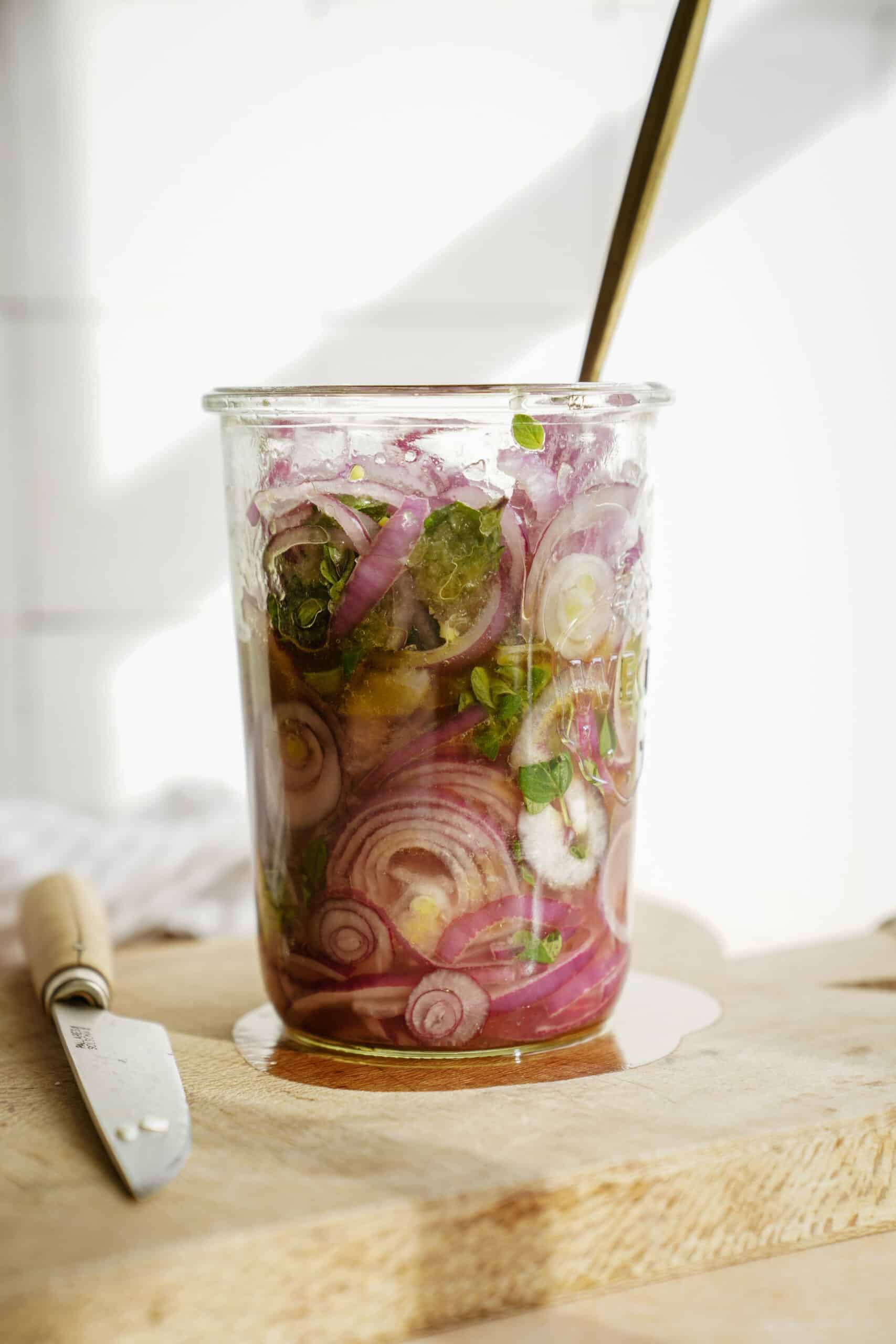 Ingredients in jar for pickling onions