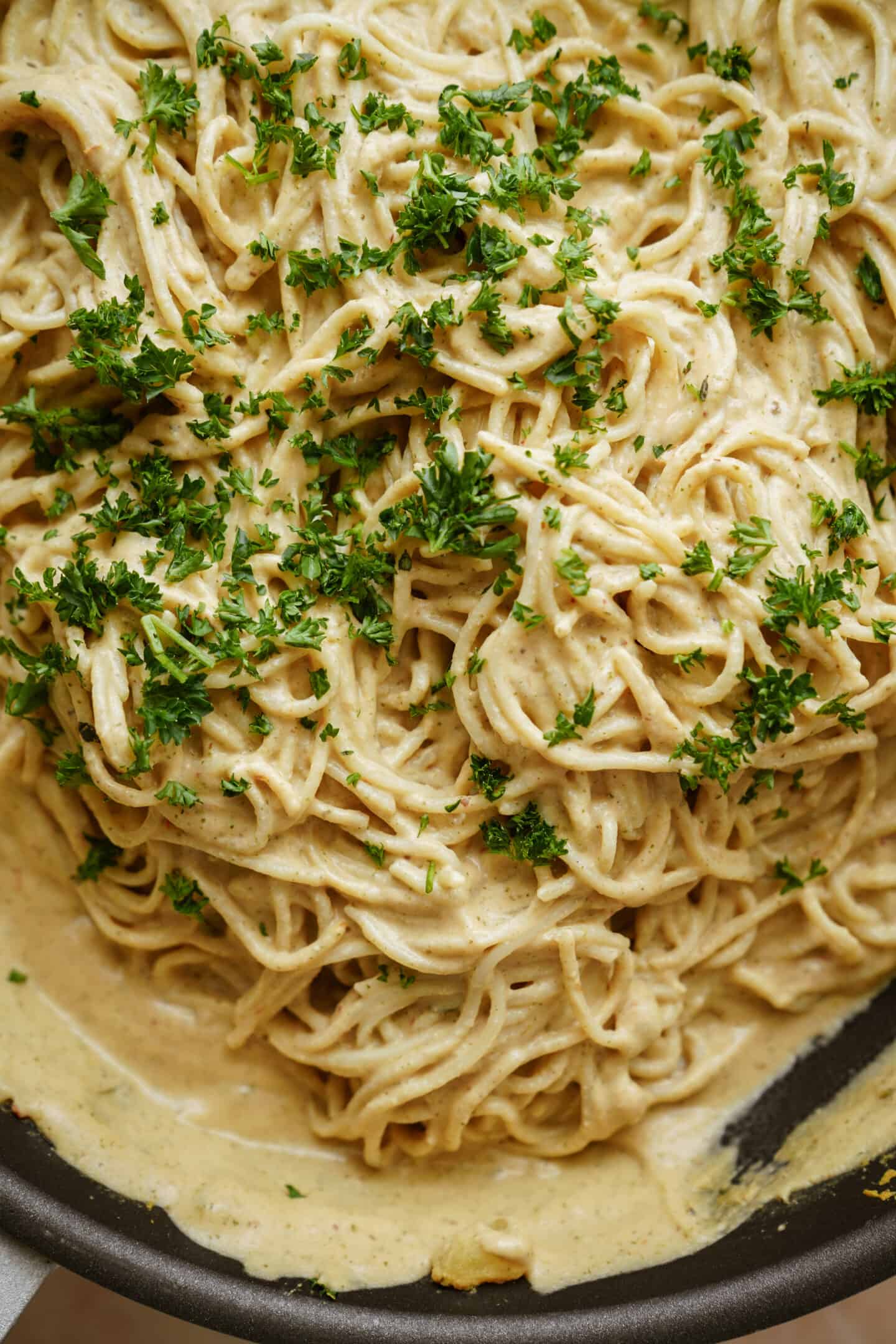 Spaghettini recipe with fresh parsley on top