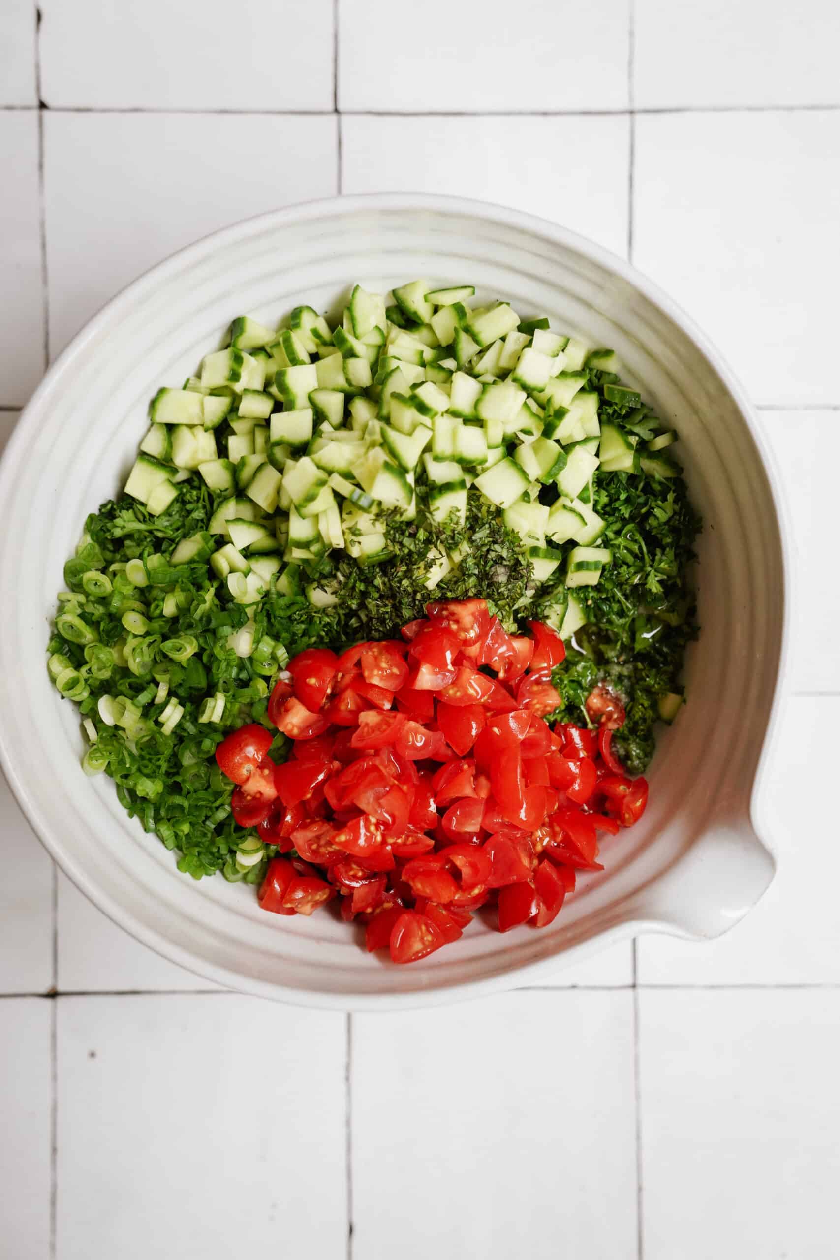 Ingredients for tabbouleh salad in a bowl