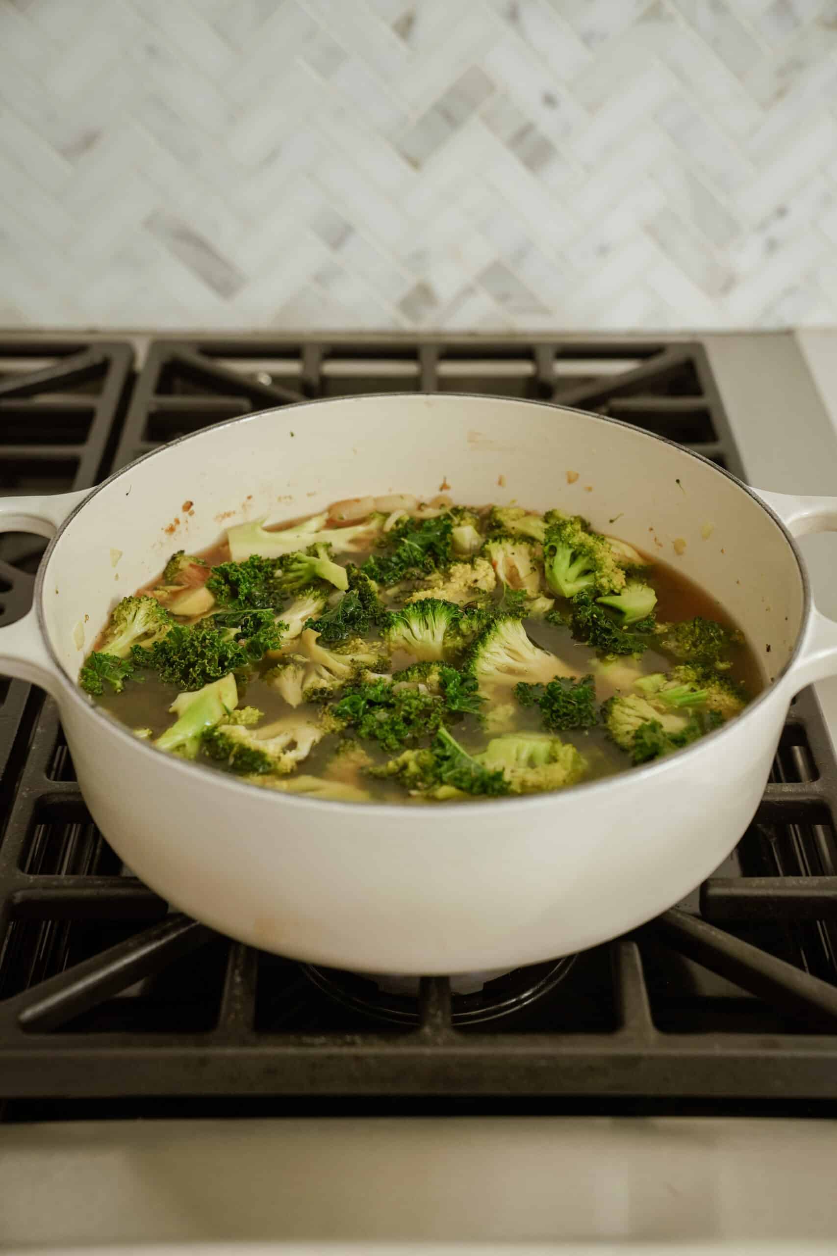 Cooking vegan broccoli soup in pot