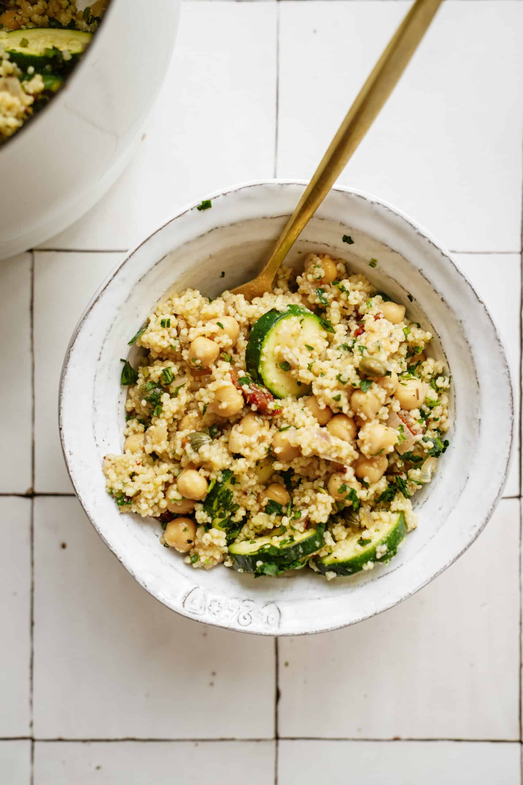 warm couscous salad in bowl