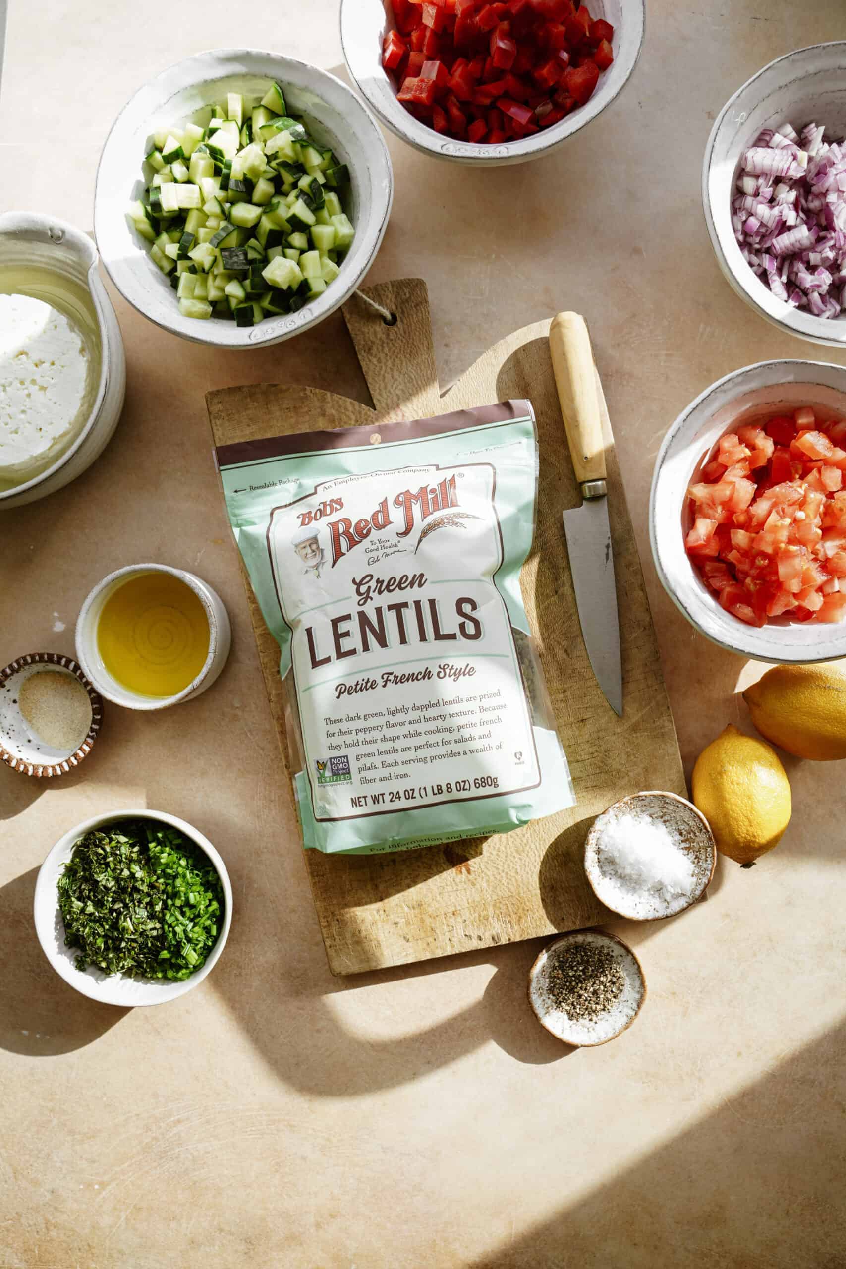 Ingredients for lentil salad on a cutting board