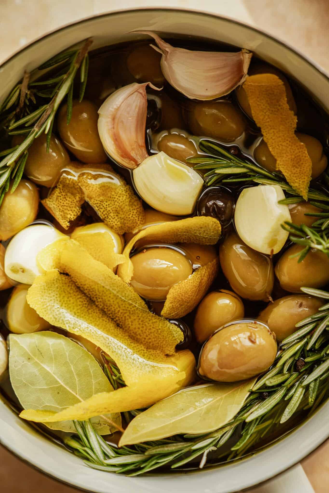 olives marinating in a pot