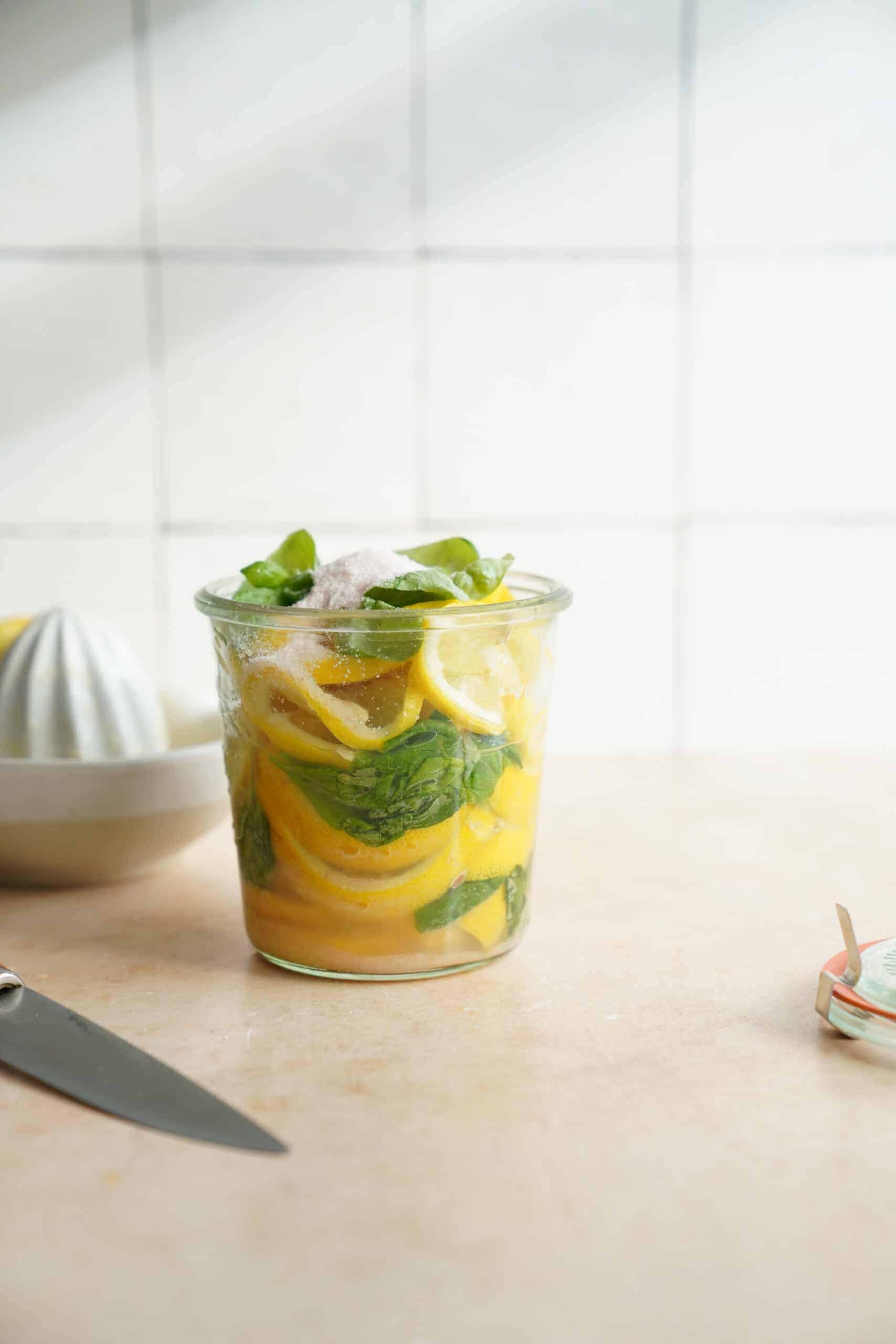 preserved lemons and basil in jar