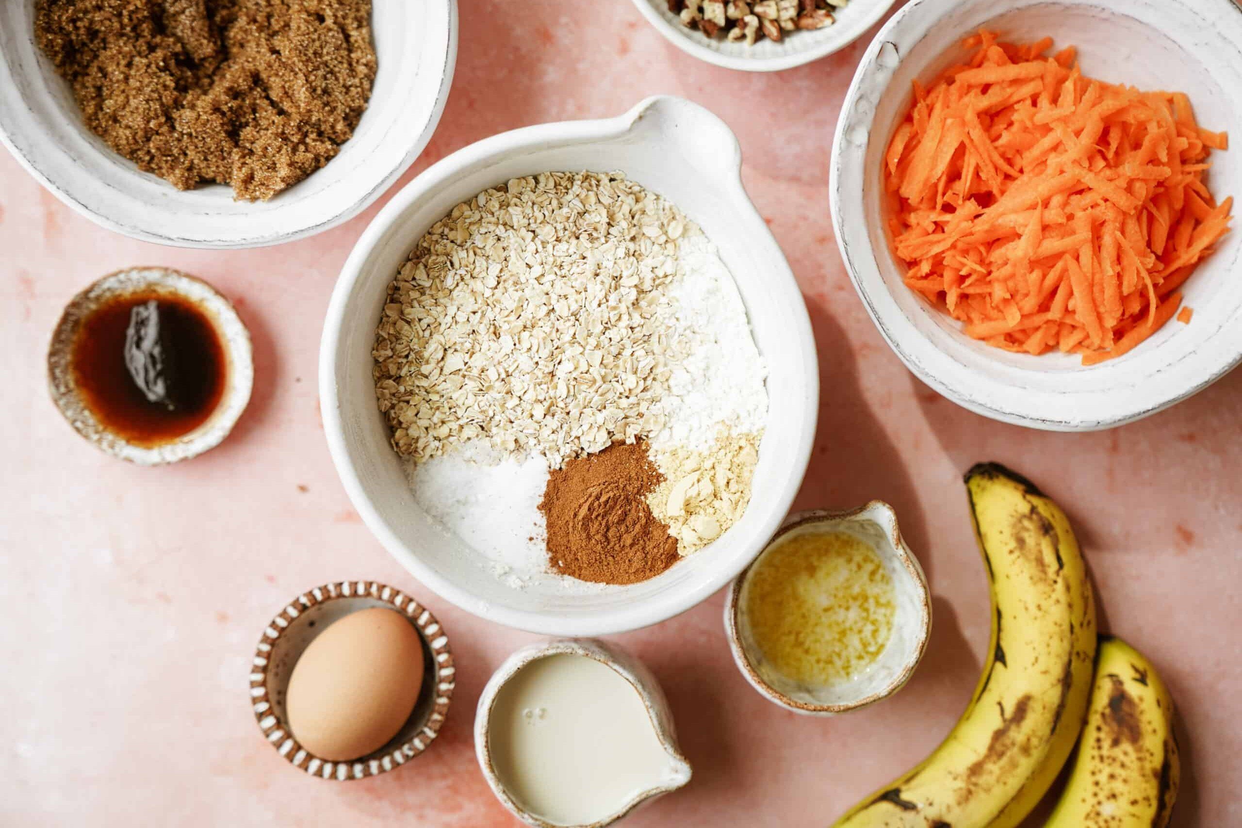 Ingredients for carrot cake banana bread laid out on counter