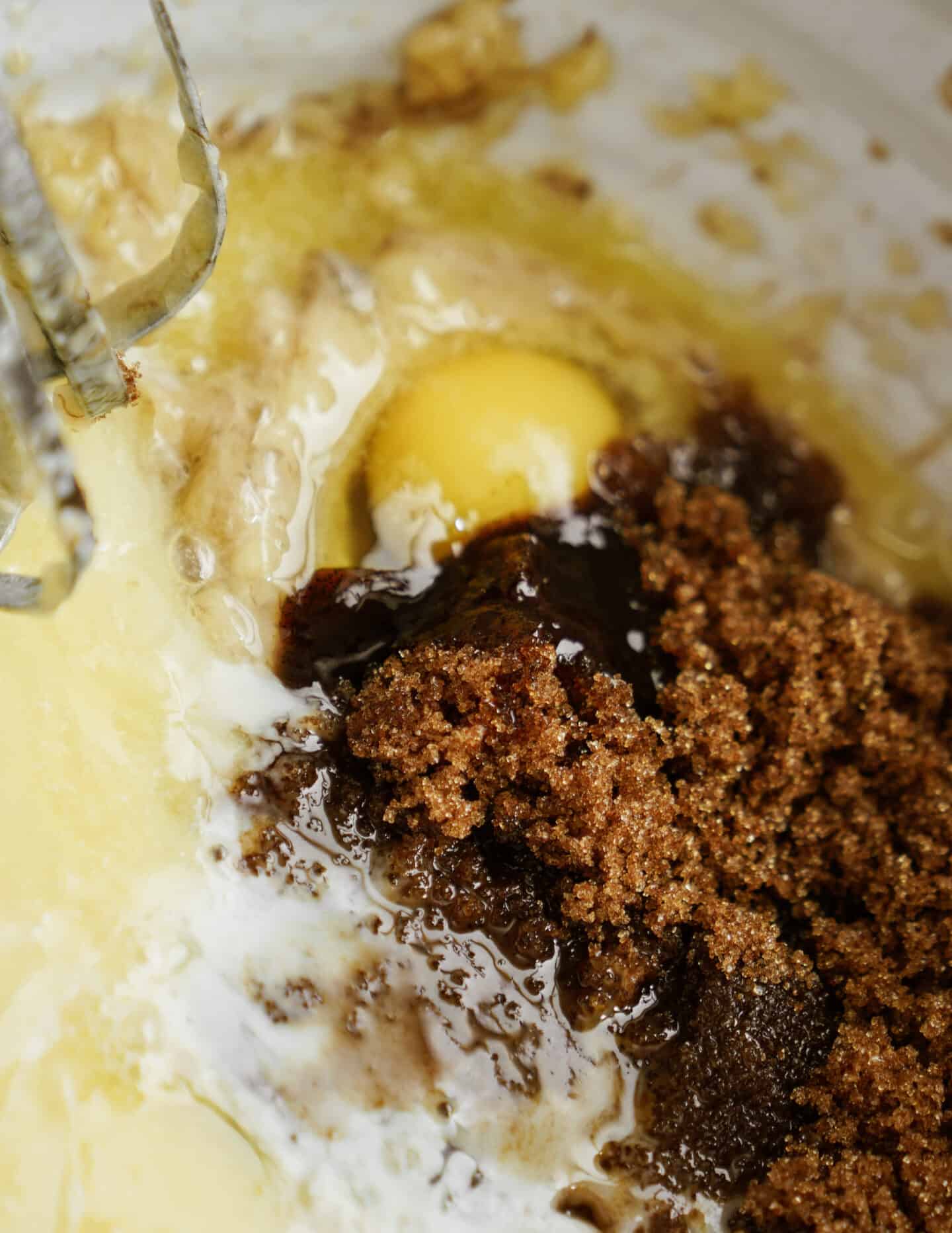 Wet ingredients for carrot cake banana bread mixed together in a bowl