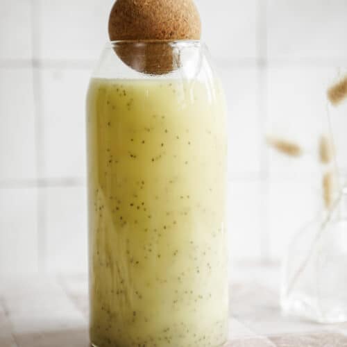 Close-up of fresh ginger juice in a bottle