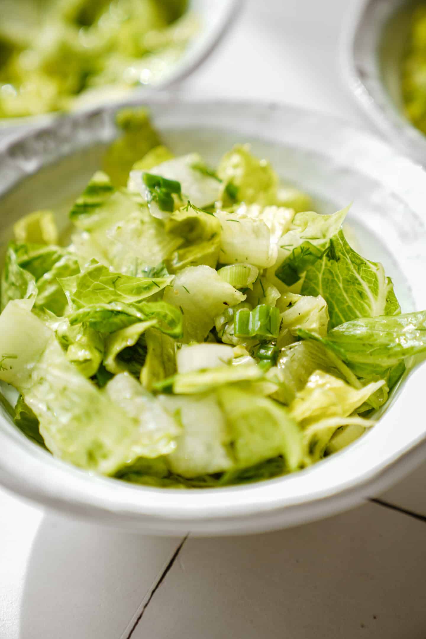 Maroulosalata in a white bowl