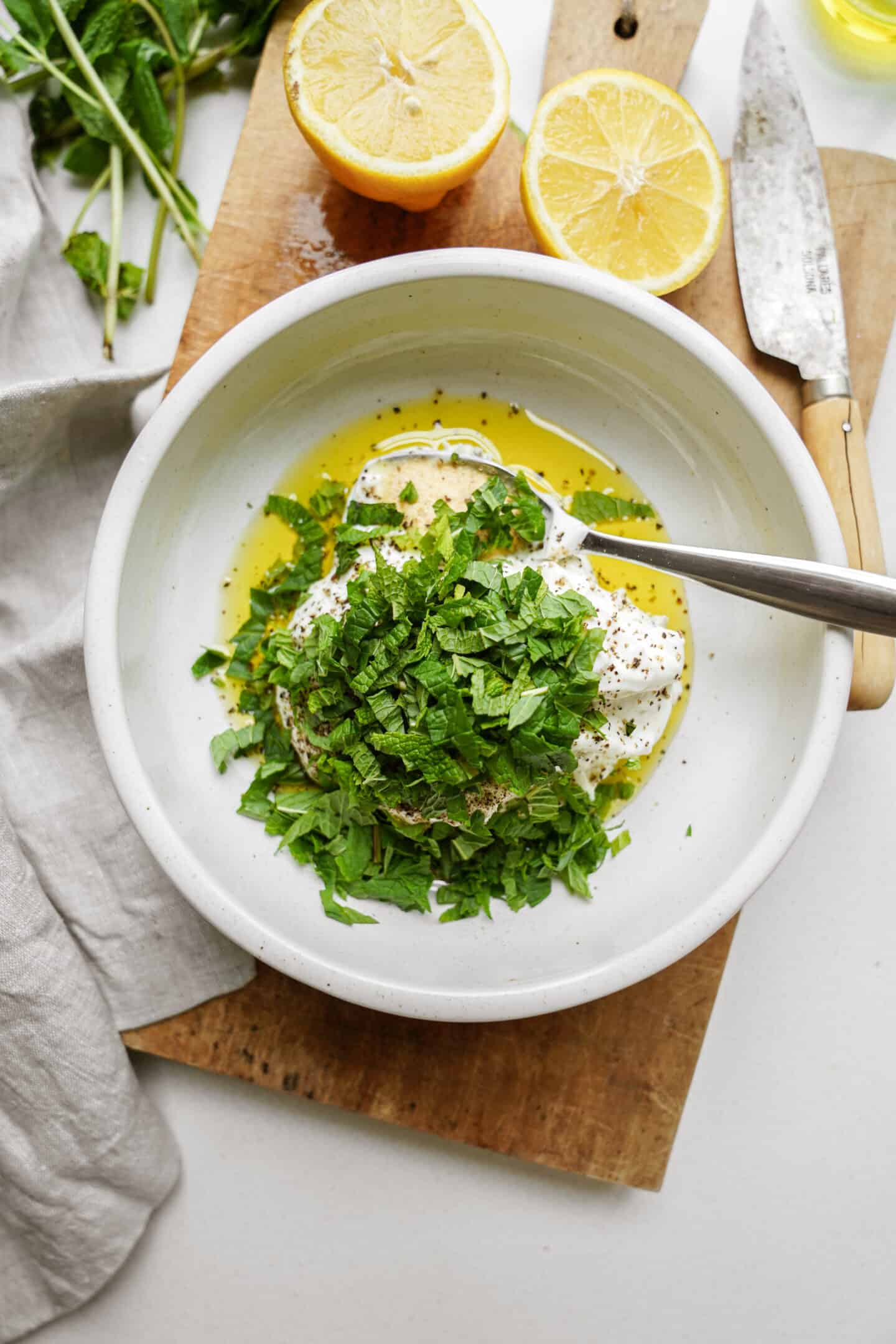 Mixing ingredients for whipped yogurt for crispy chickpeas