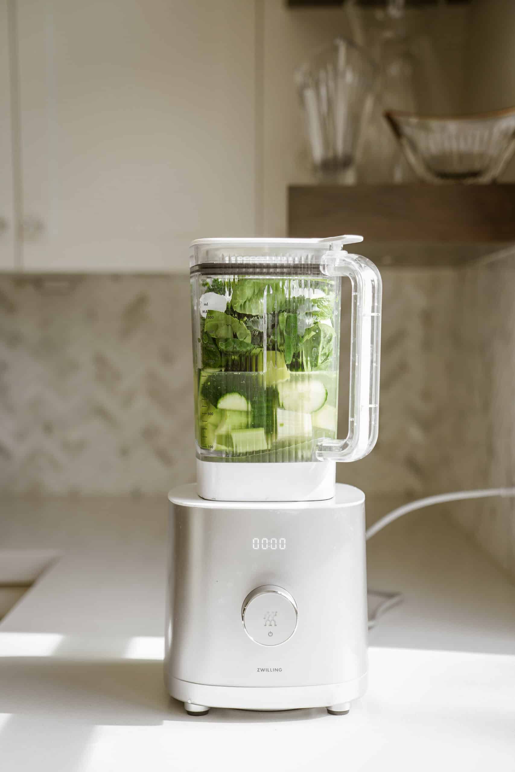 Ingredients for green smoothie in a blender