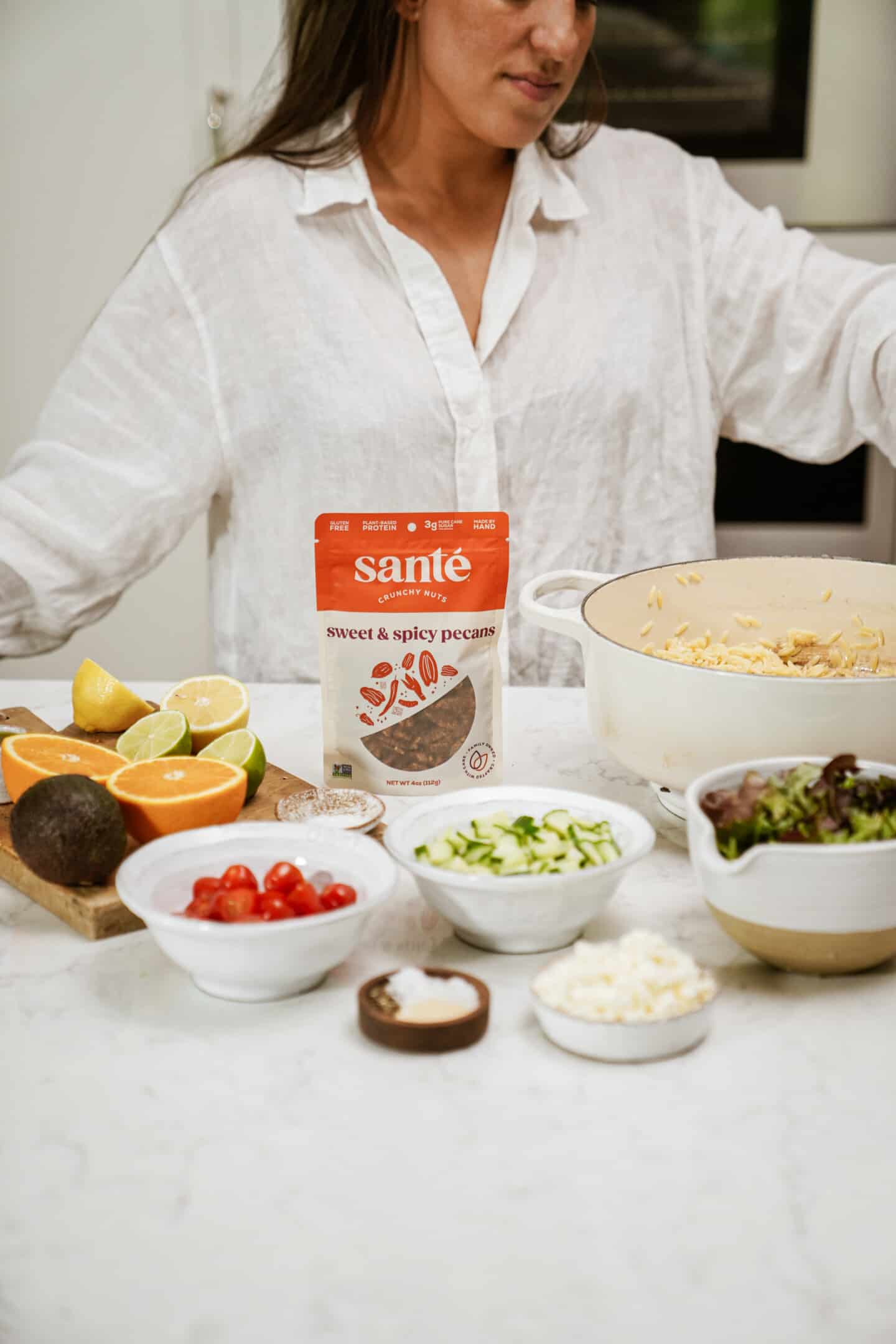 Ingredients on table for summer salad with Sante nuts