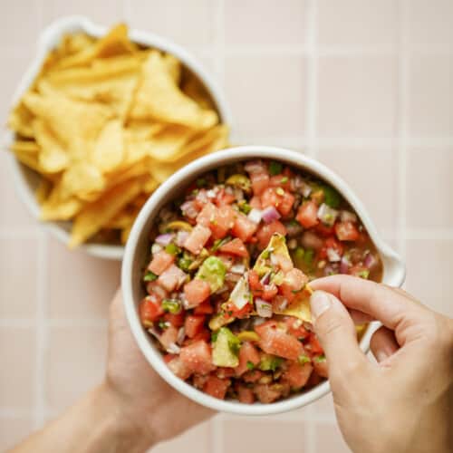 vegan ceviche with watermelon in a white bowl and ready to eat