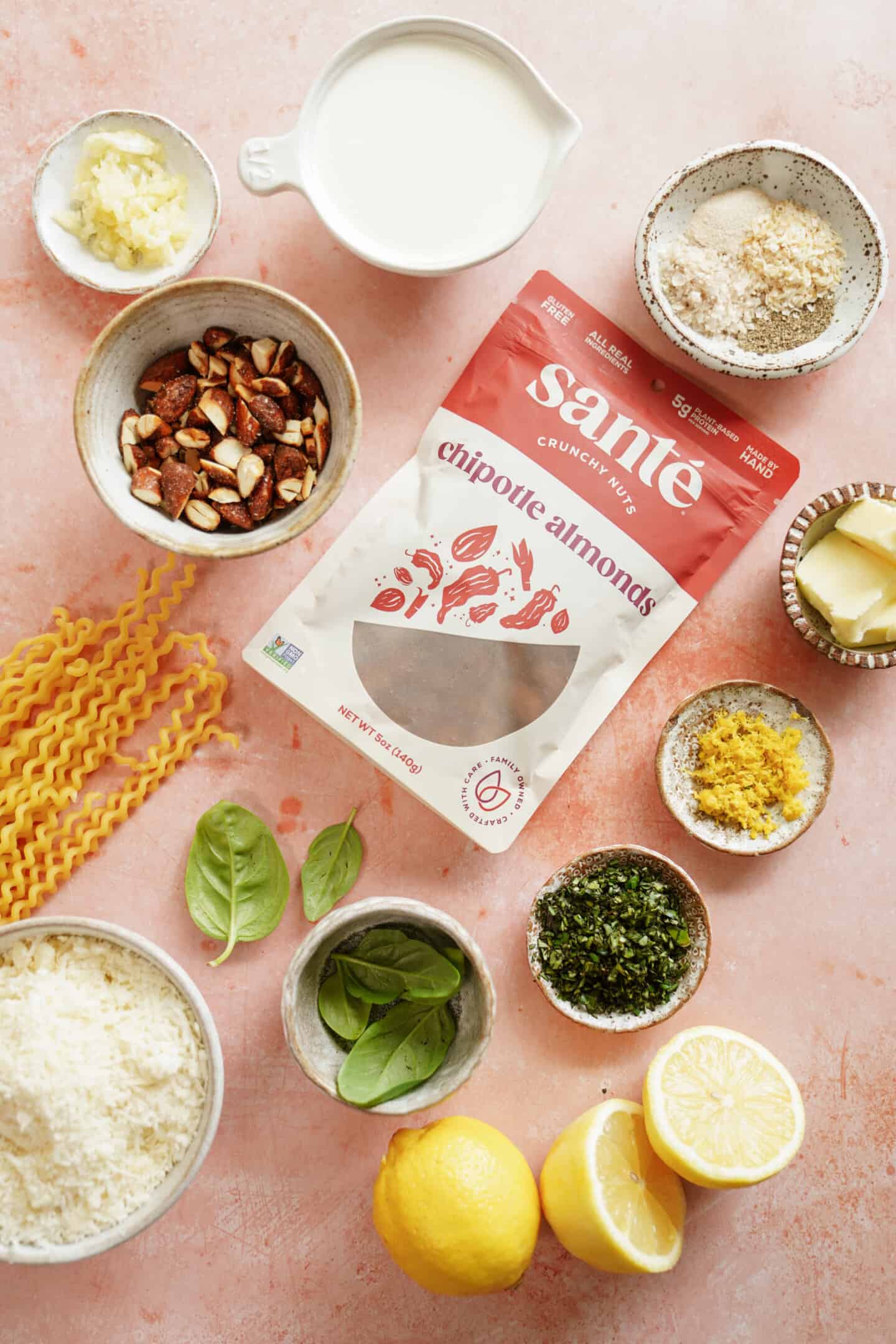 Sante Nuts on a table with ingredients for lemon garlic pasta