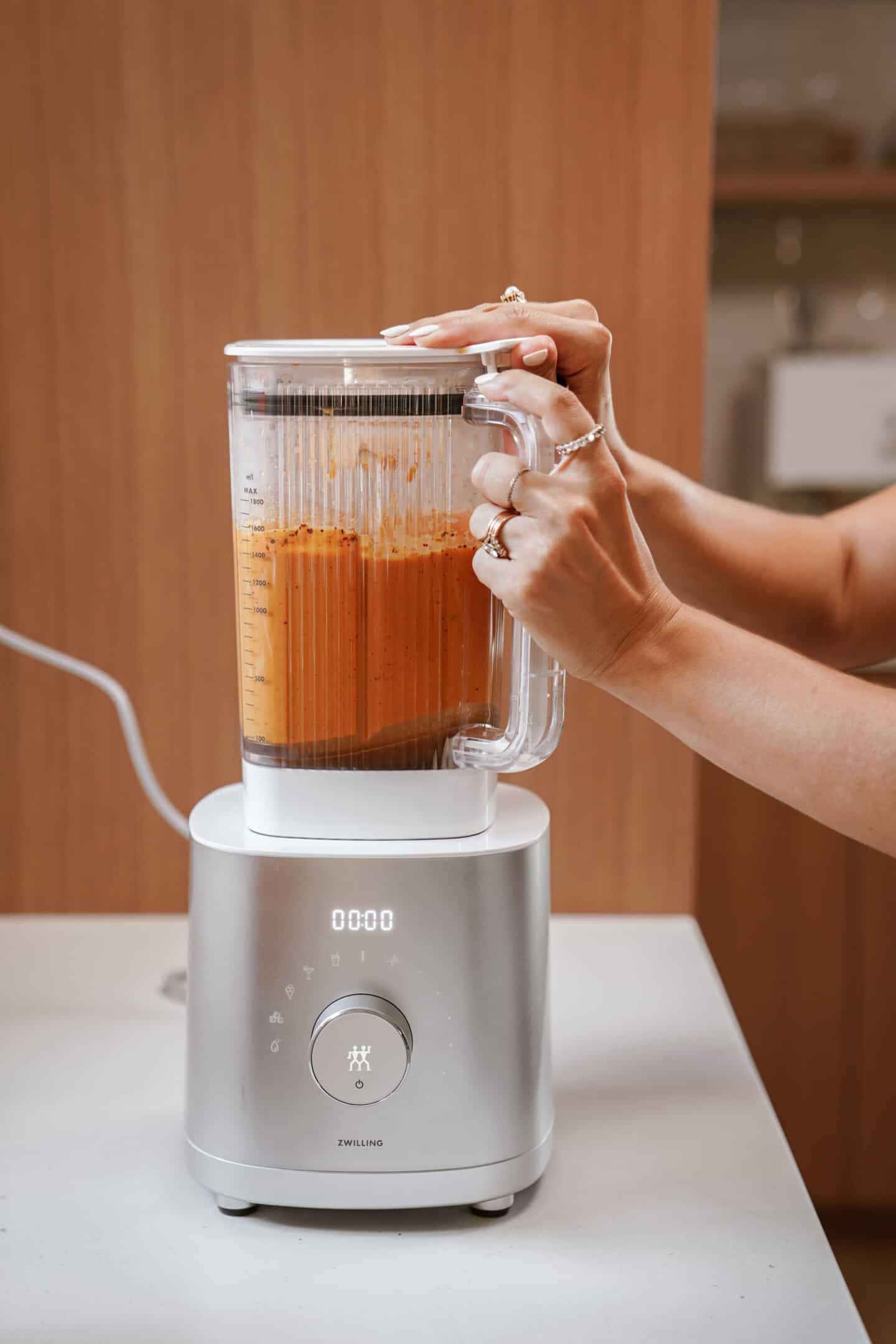 Blender mixing up the smoke vegetable soup