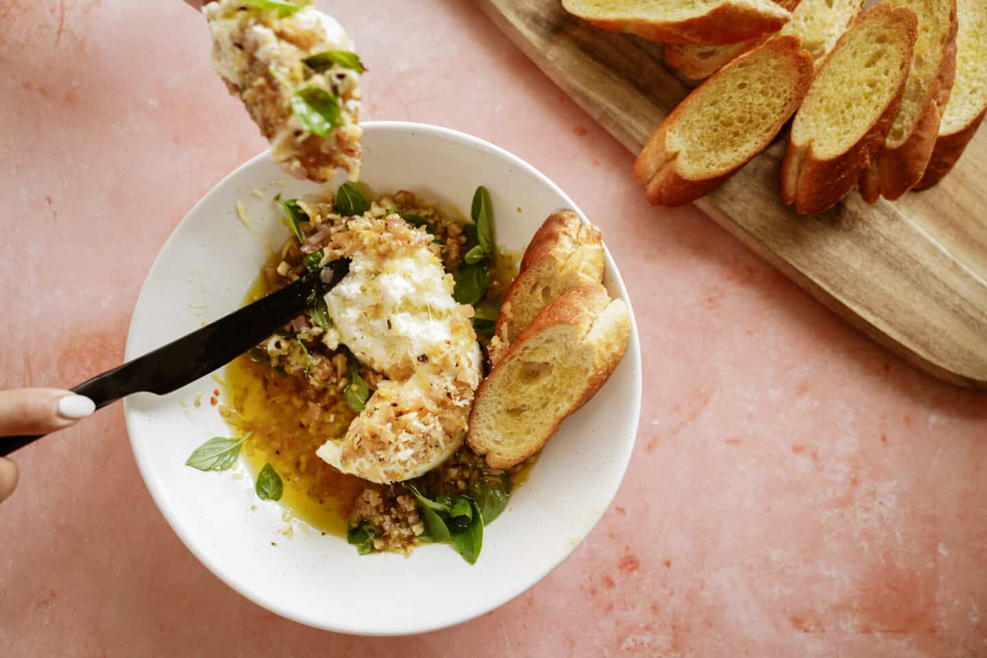 Burrata cheese with knife