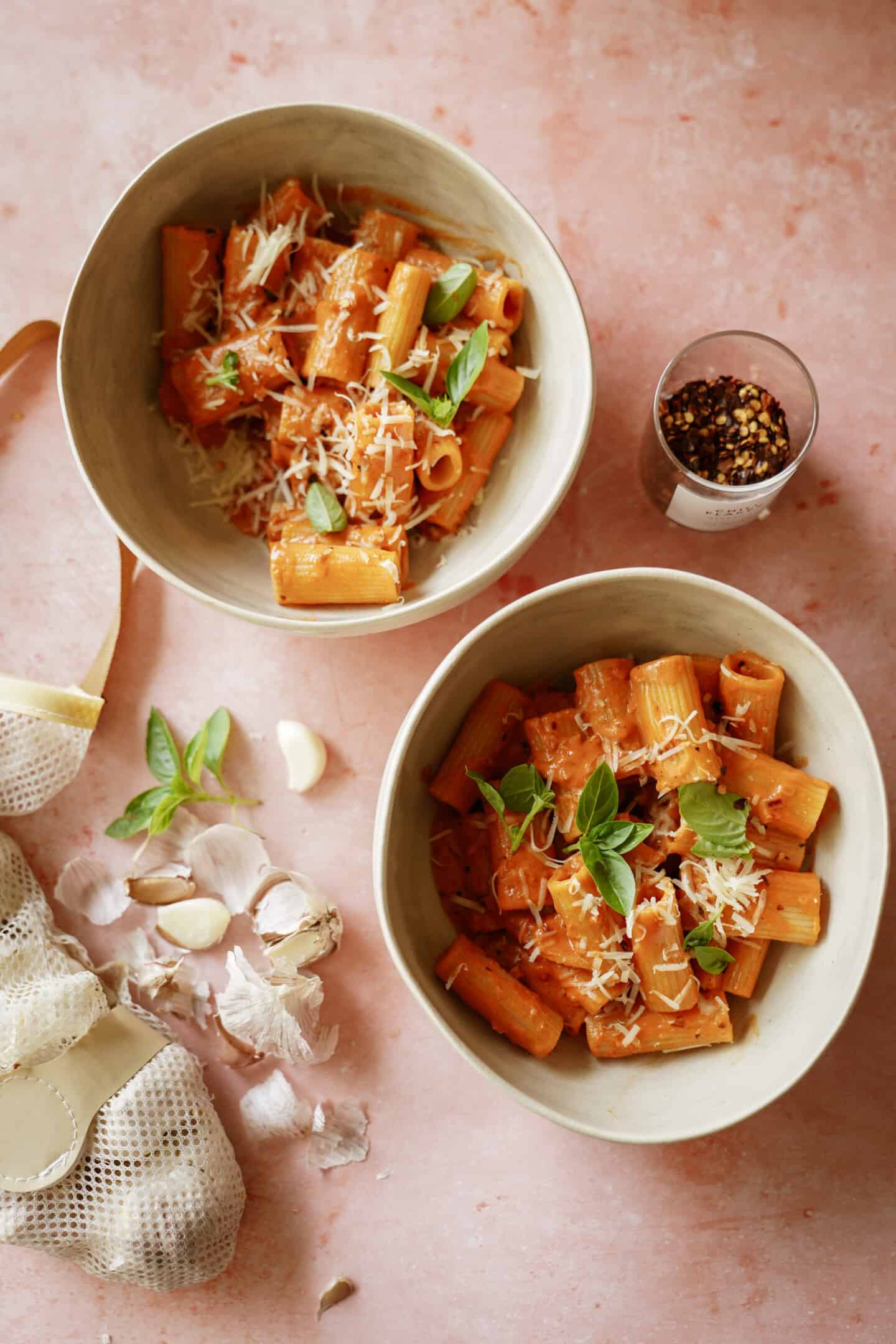 Bowls of spicy vodka pasta in two white bowls