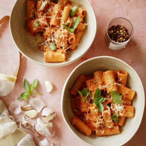 Bowls of spicy vodka pasta in two white bowls