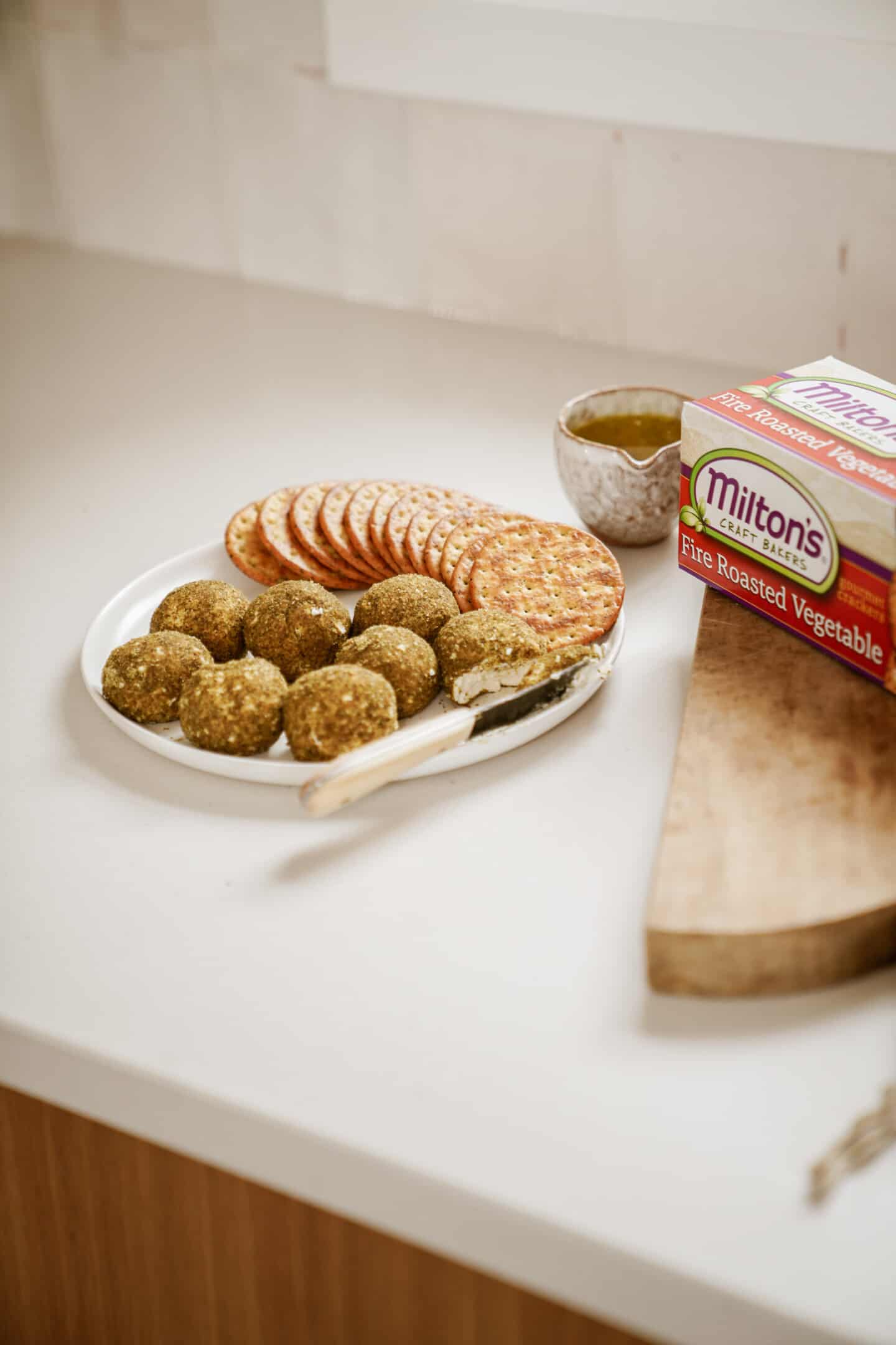 Labneh cheese balls on plate on counter