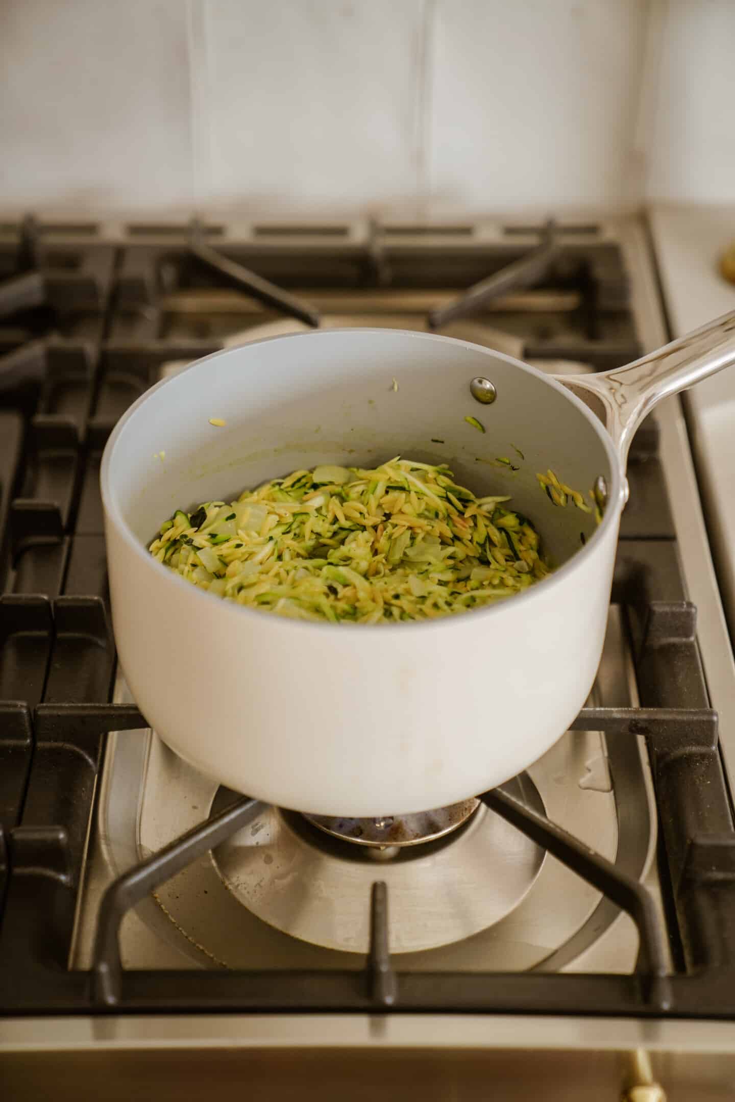 Orzo being cooked in pot