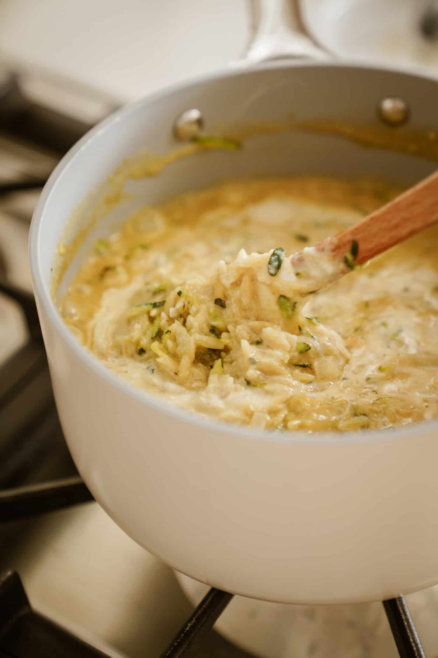 Vegan orzo in pot on stove