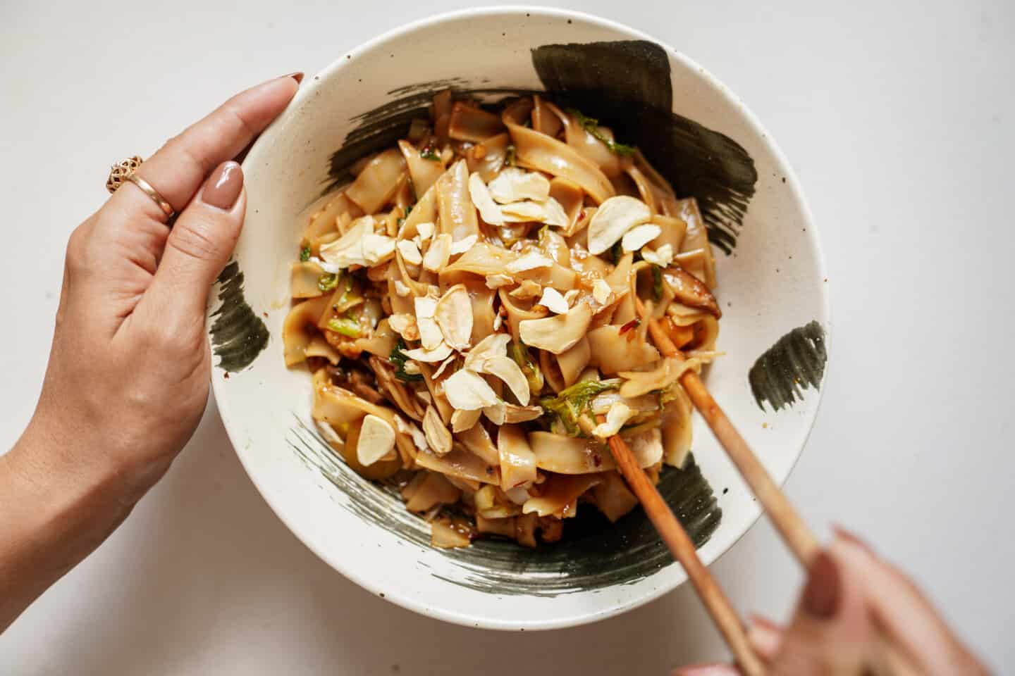 Vegetable stir fry recipe in a bowl with chopsticks