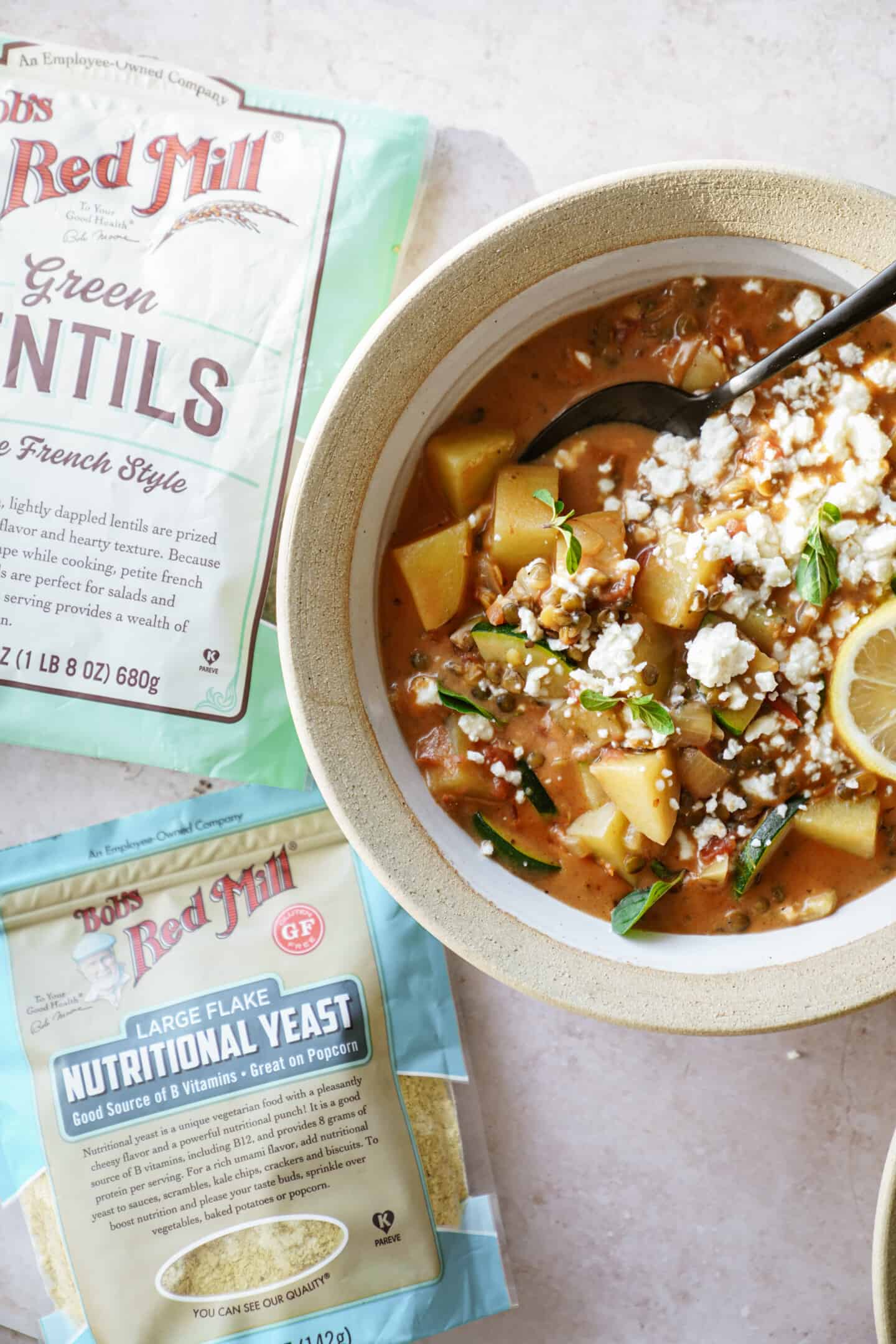Creamy potato soup next to ingredients