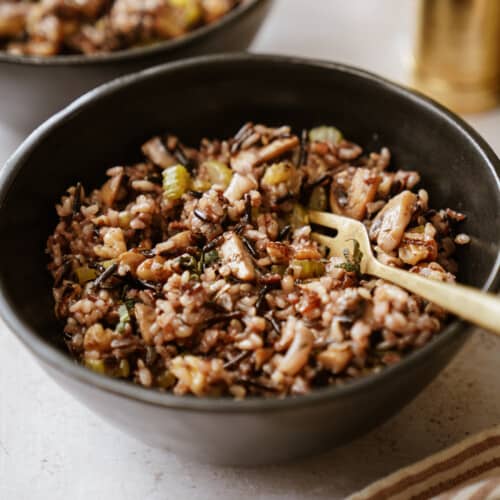 Gluten-free stuffing in a bowl with a spoon