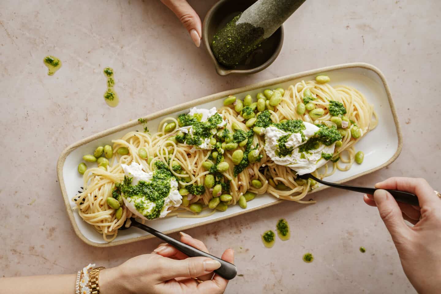 Close-up of a tray of pesto pasta