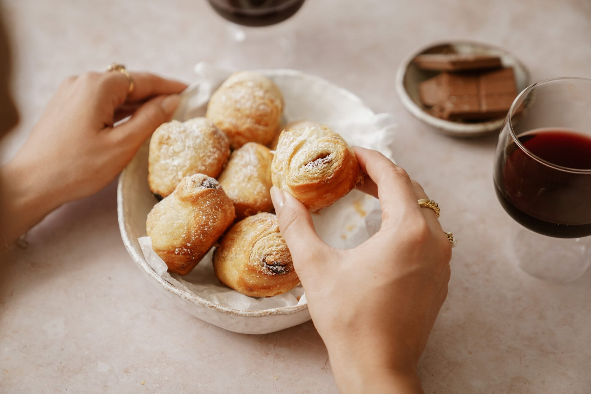 Hand holding a cruffin