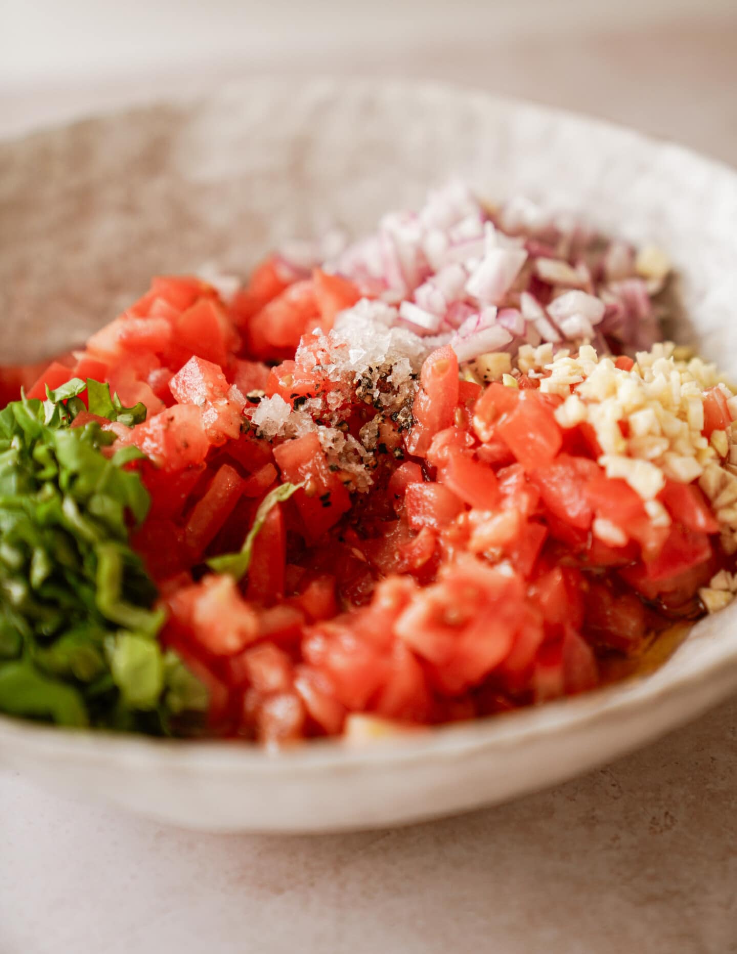 Bowl of ingredients for bruschetta recipe