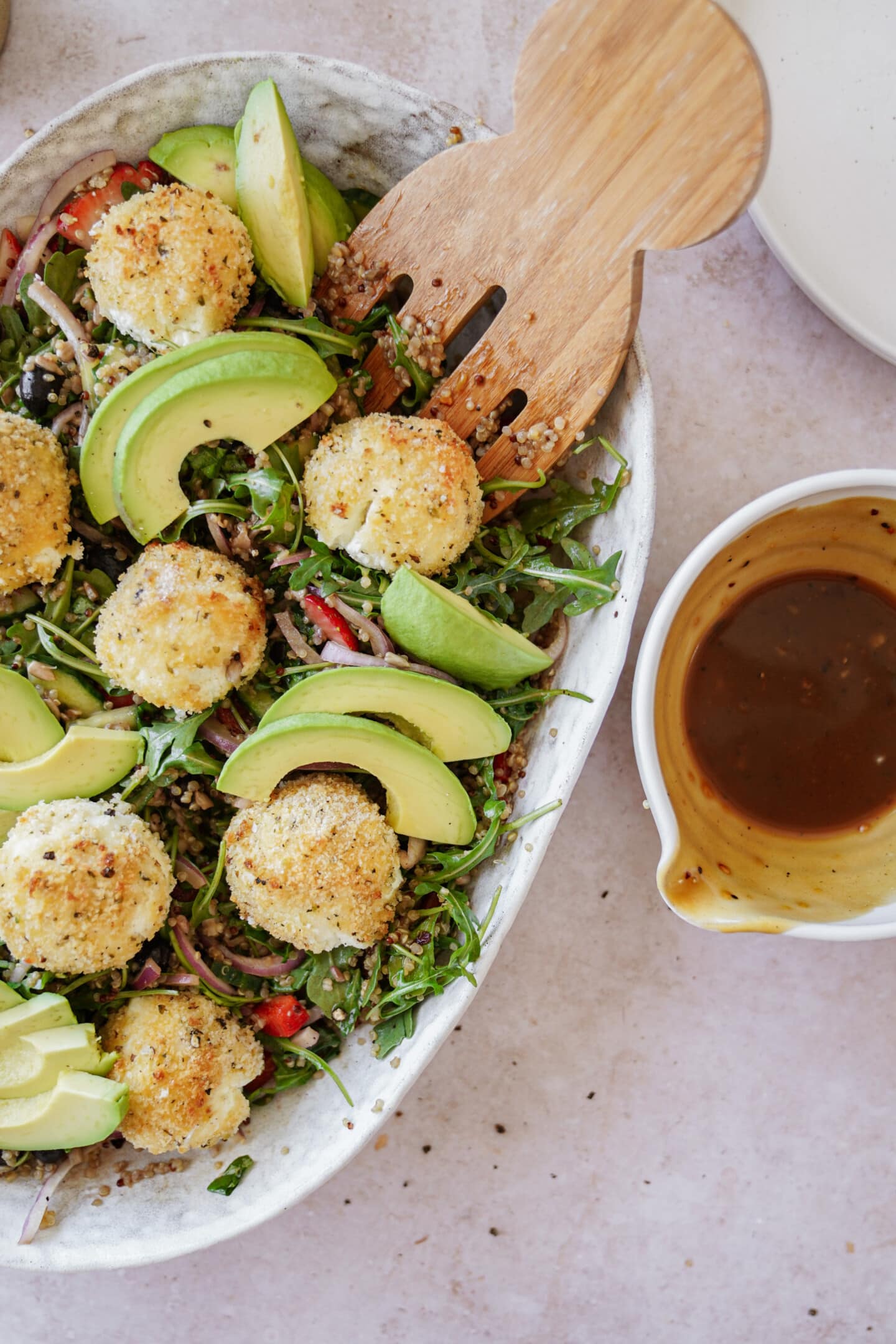 Goat cheese balls in a serving dish