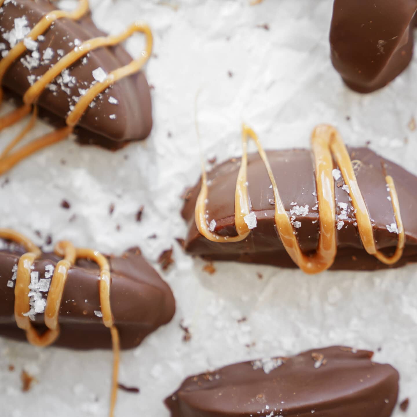 chocolate covered apples on a tray