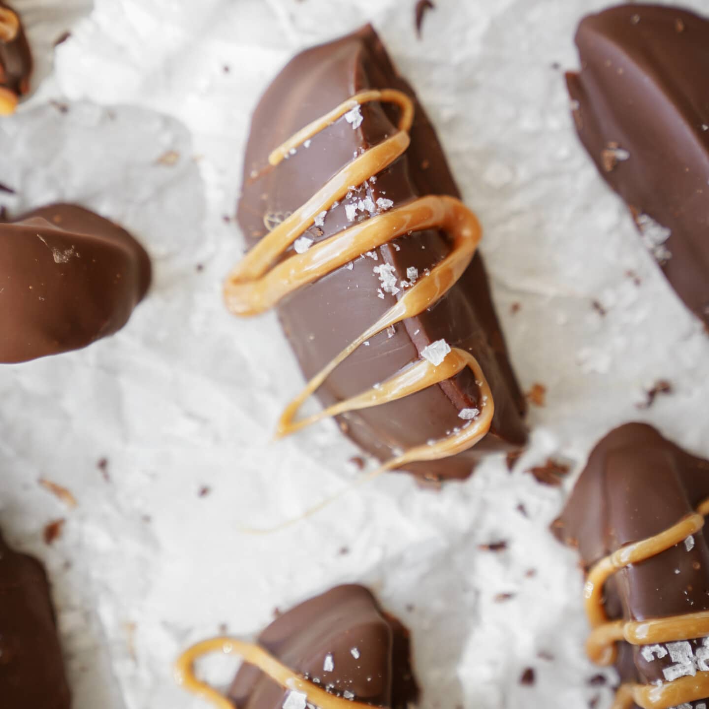 chocolate covered apples on a tray