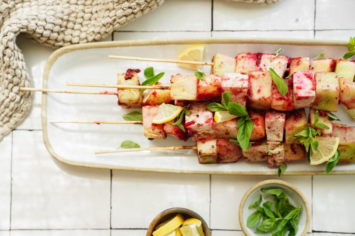 Fruit kabobs on a serving dish