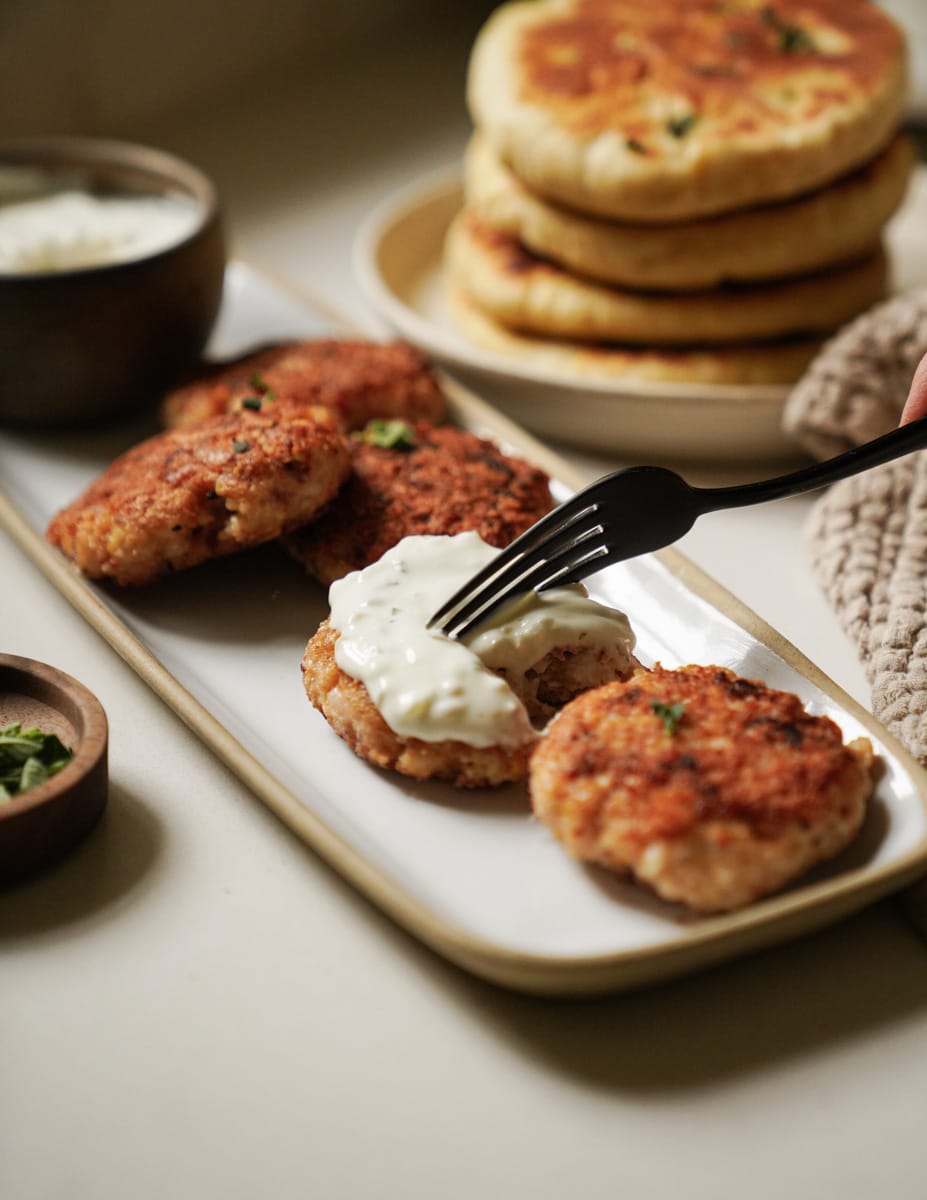 Up close of shrimp cakes on platter