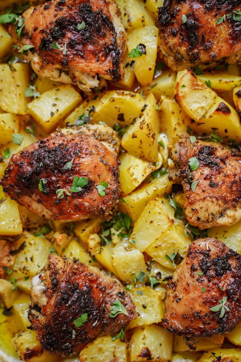 Close up of Greek chicken in a casserole dish