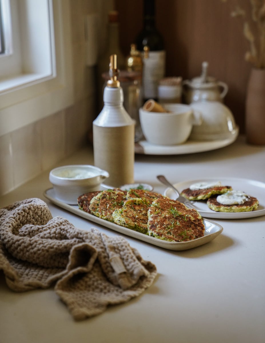 Greek fritters on a serving dish on the counter