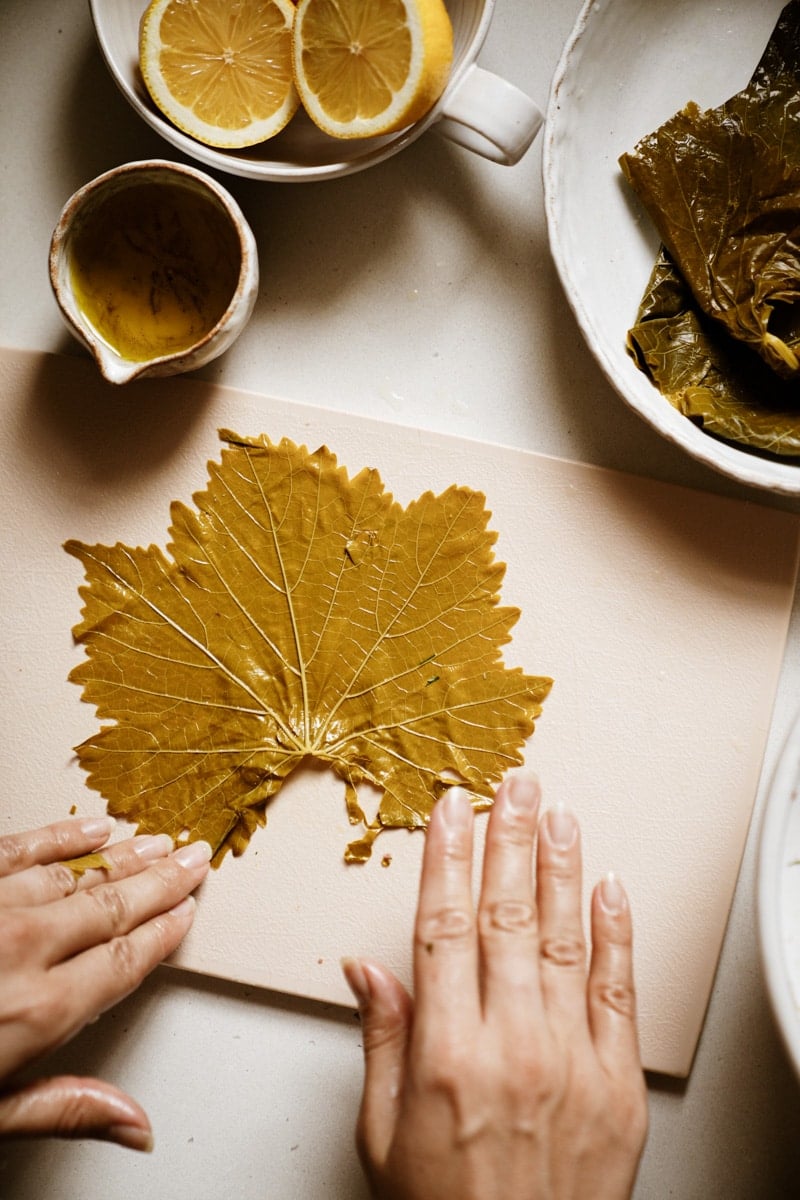 Rolling out grape leaves