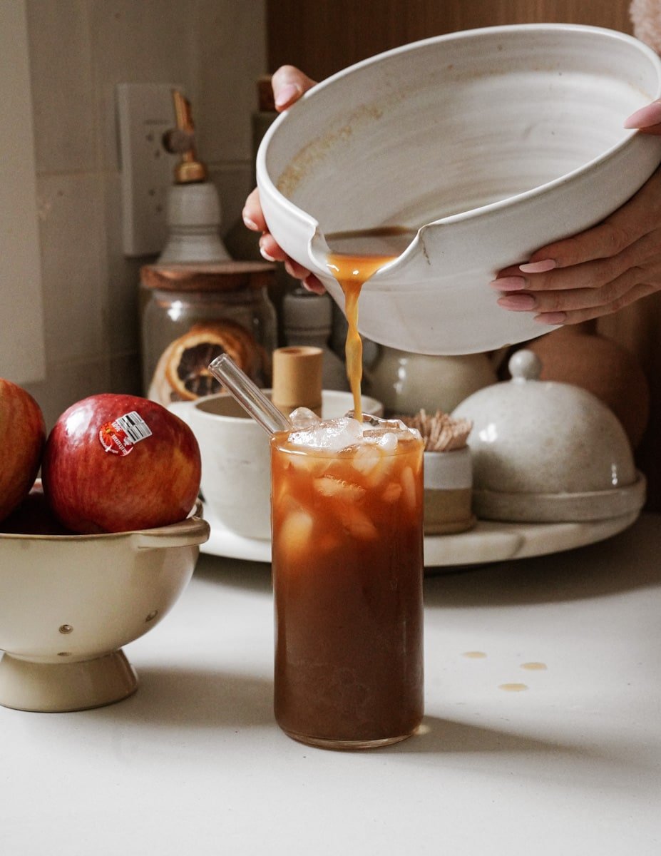 Apple juice recipe being poured into a glass