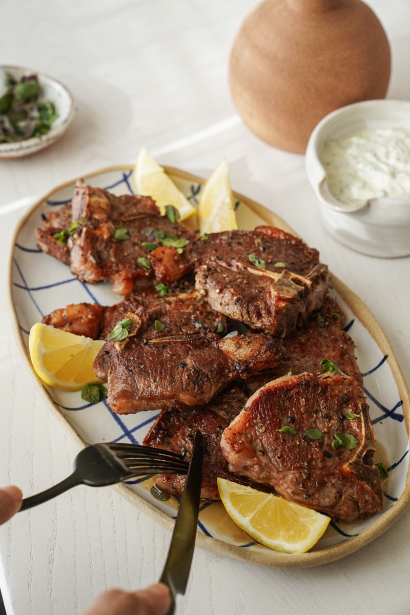 Platter of lamb chops on a table