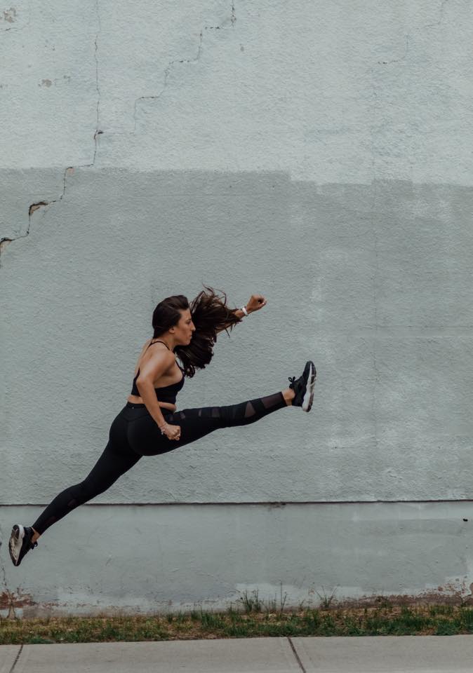 Maria doing a jump split