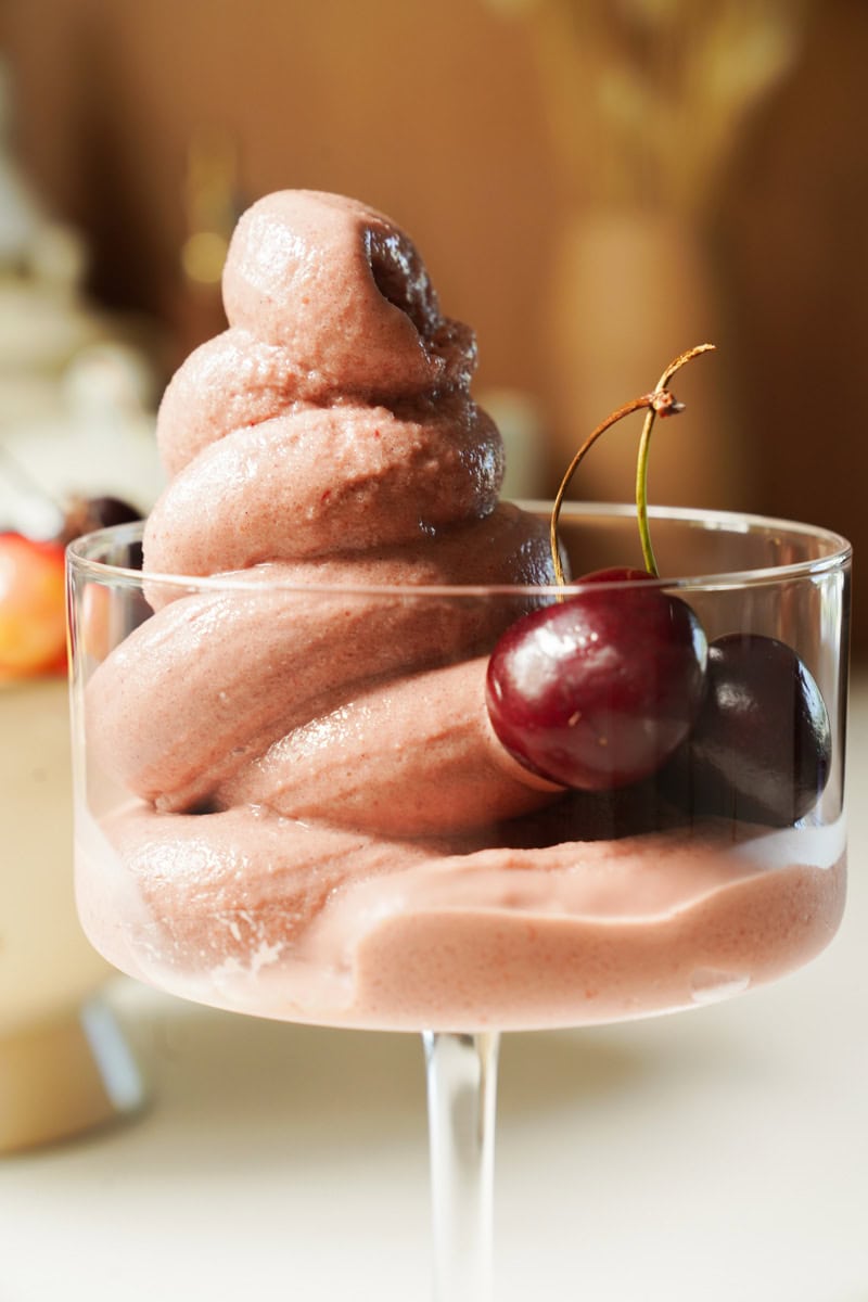 Cherry Frozen Yogurt Recipe in a cup with fresh cherries